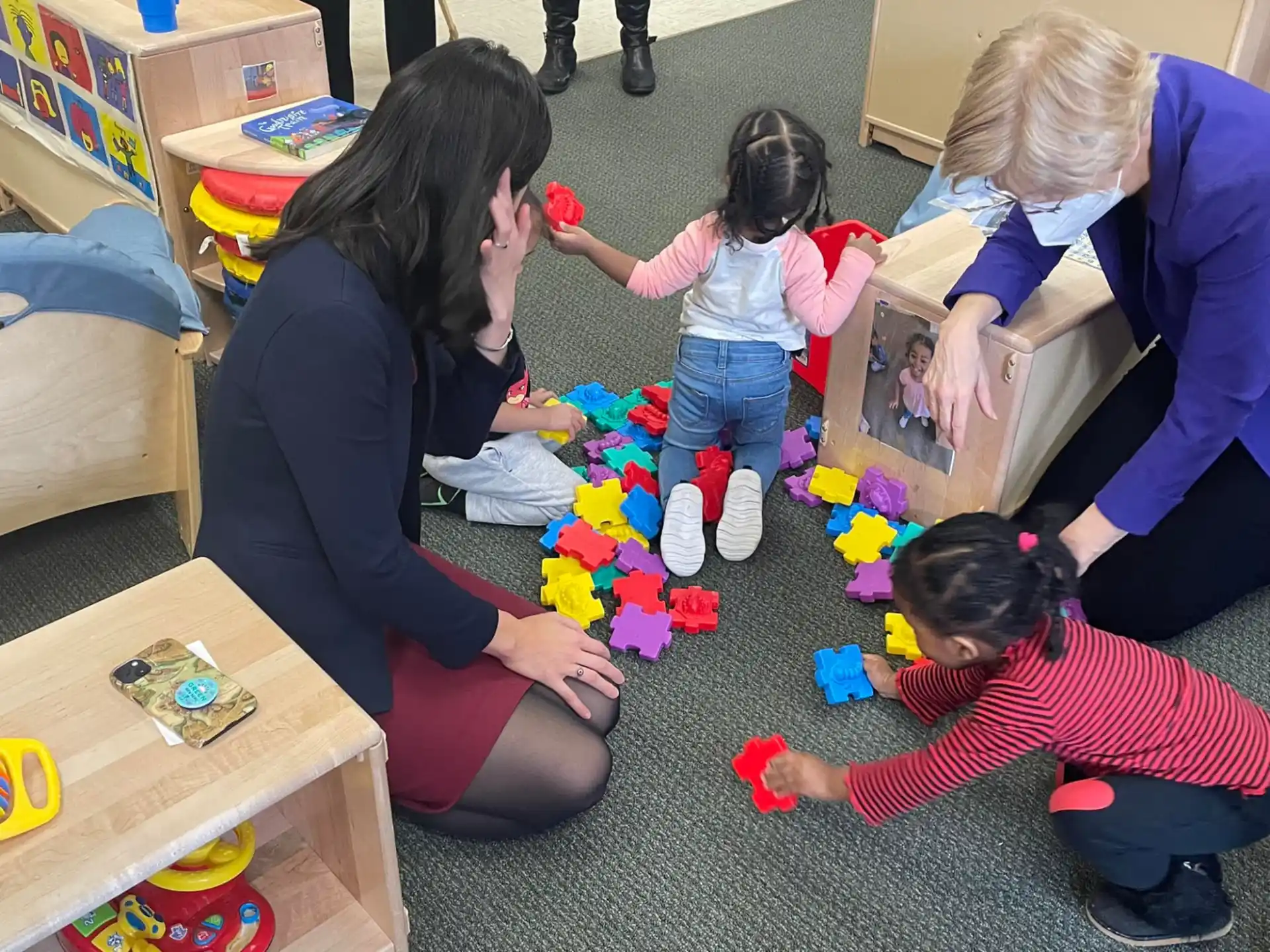 a person and a group of children