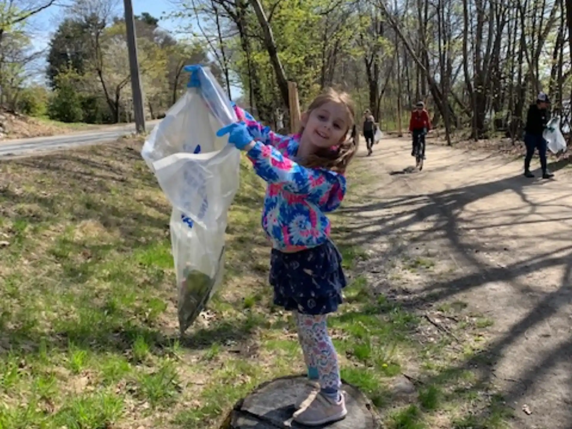 a girl holding a kite