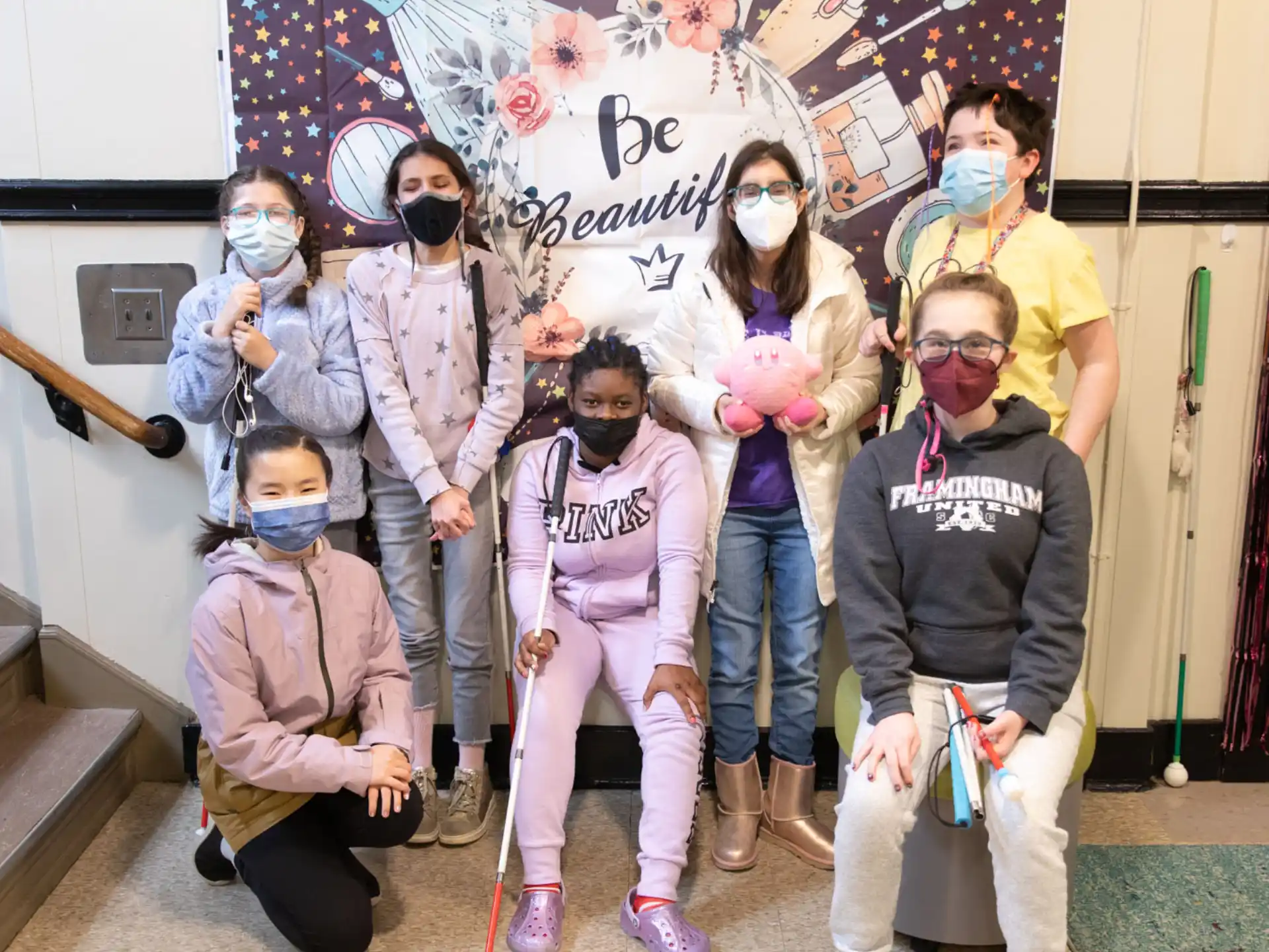 a group of people wearing masks