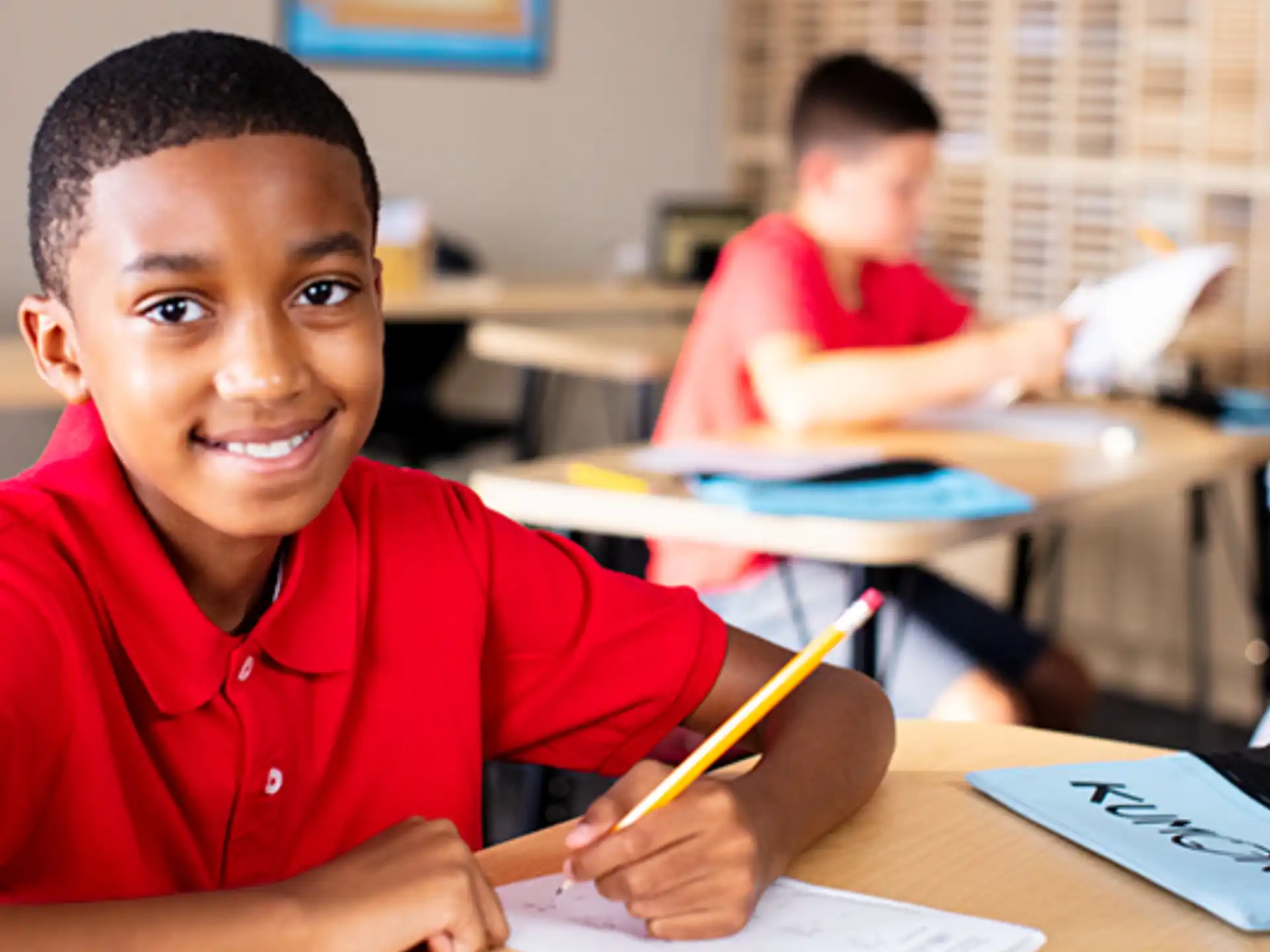 a young boy smiling