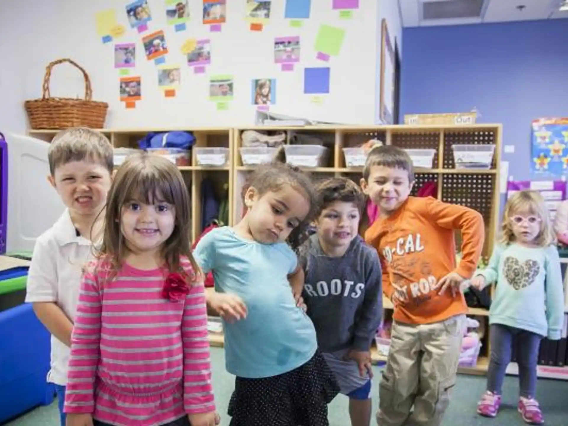 a group of children posing for a photo