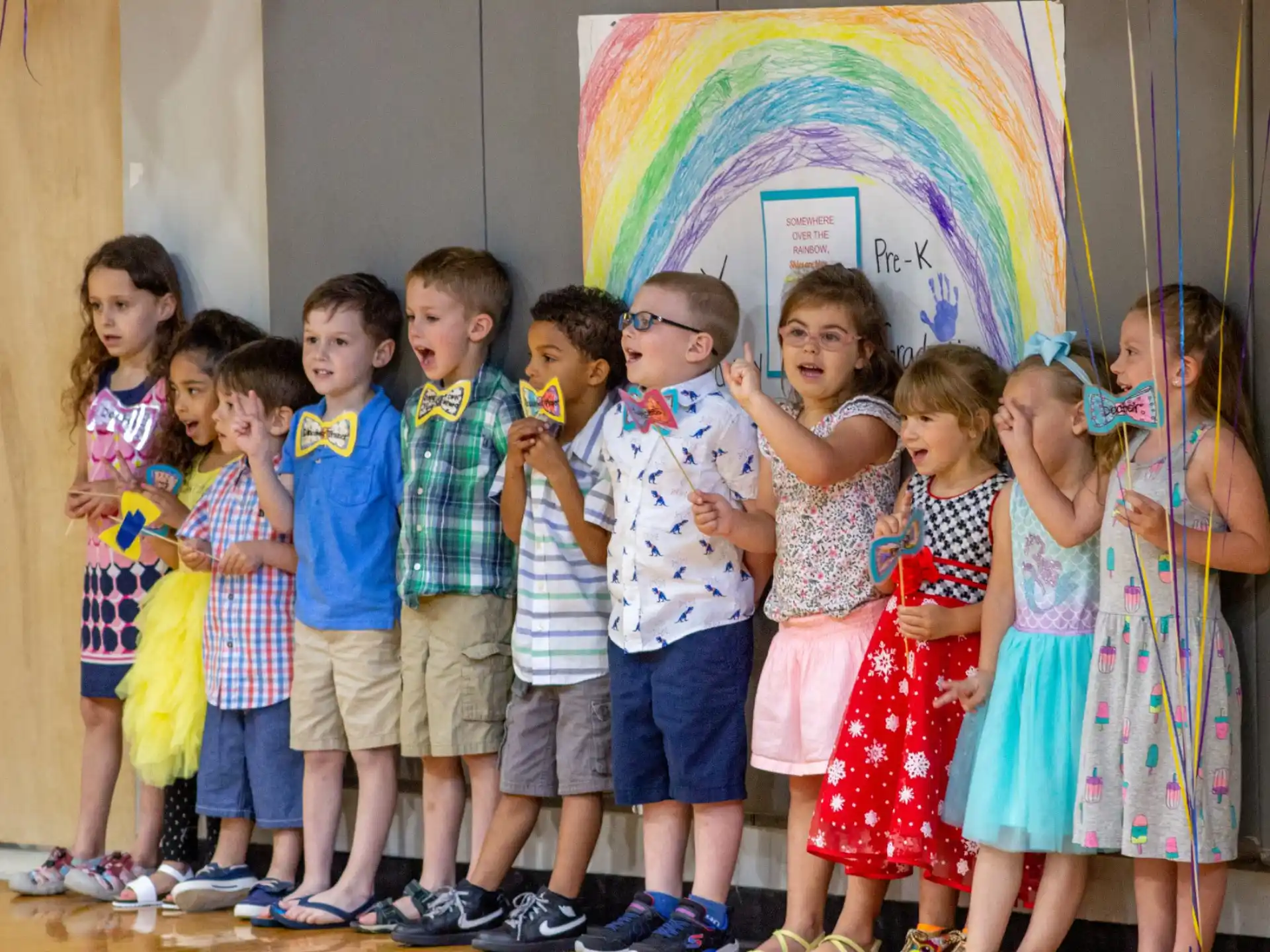 a group of children posing for a photo