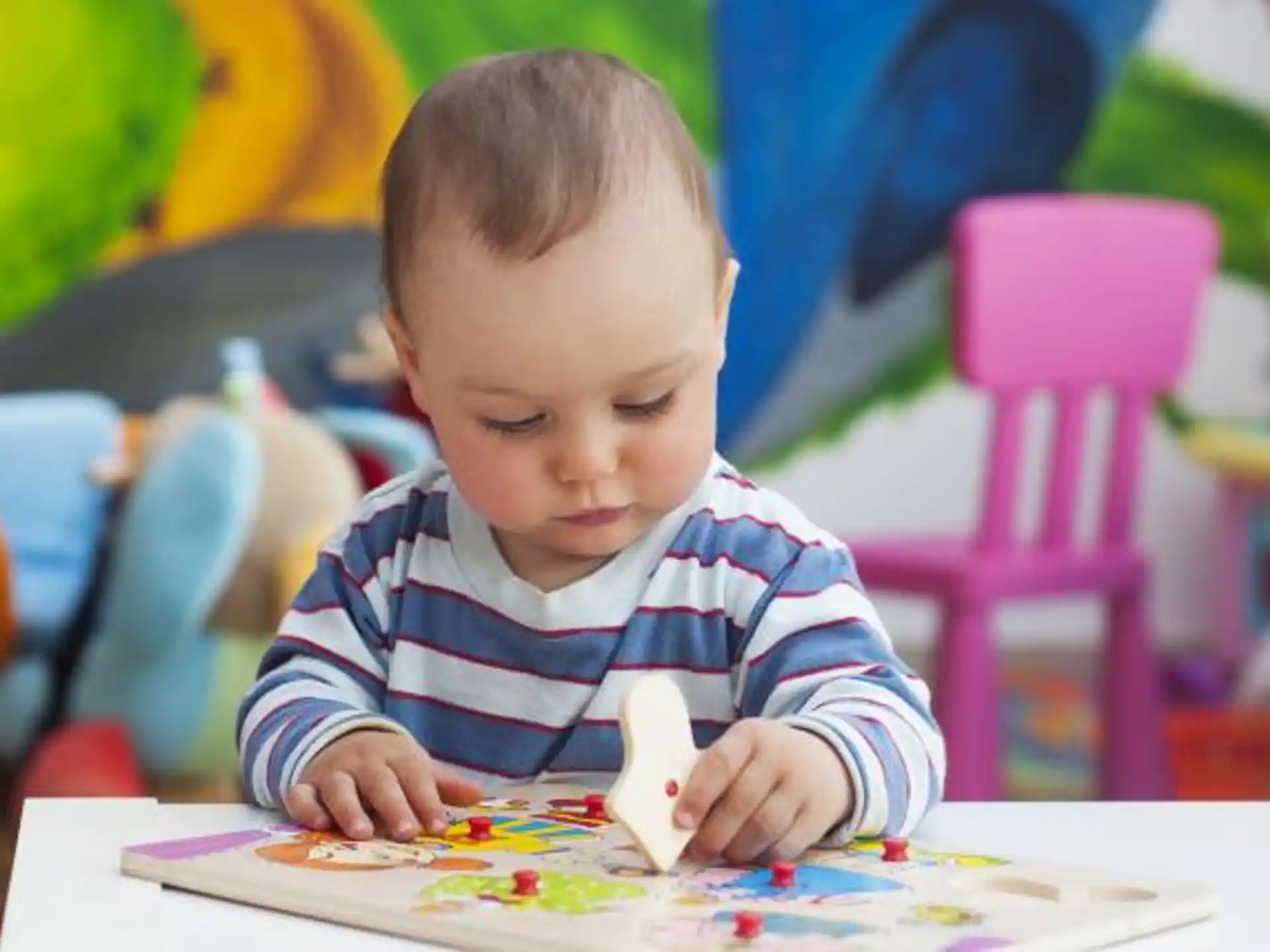 a child coloring on a paper