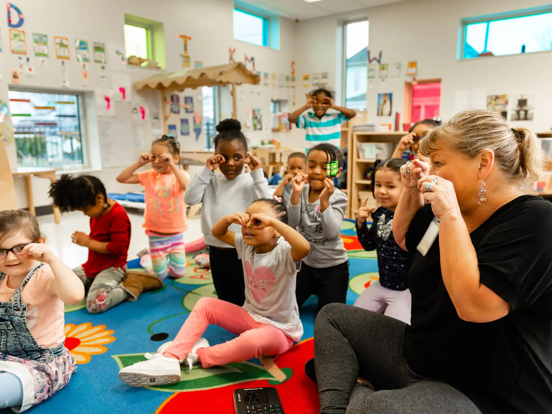 a person and a group of children