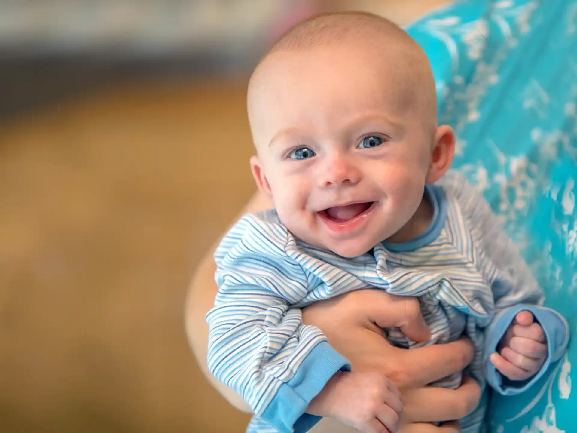 a baby sitting on a chair