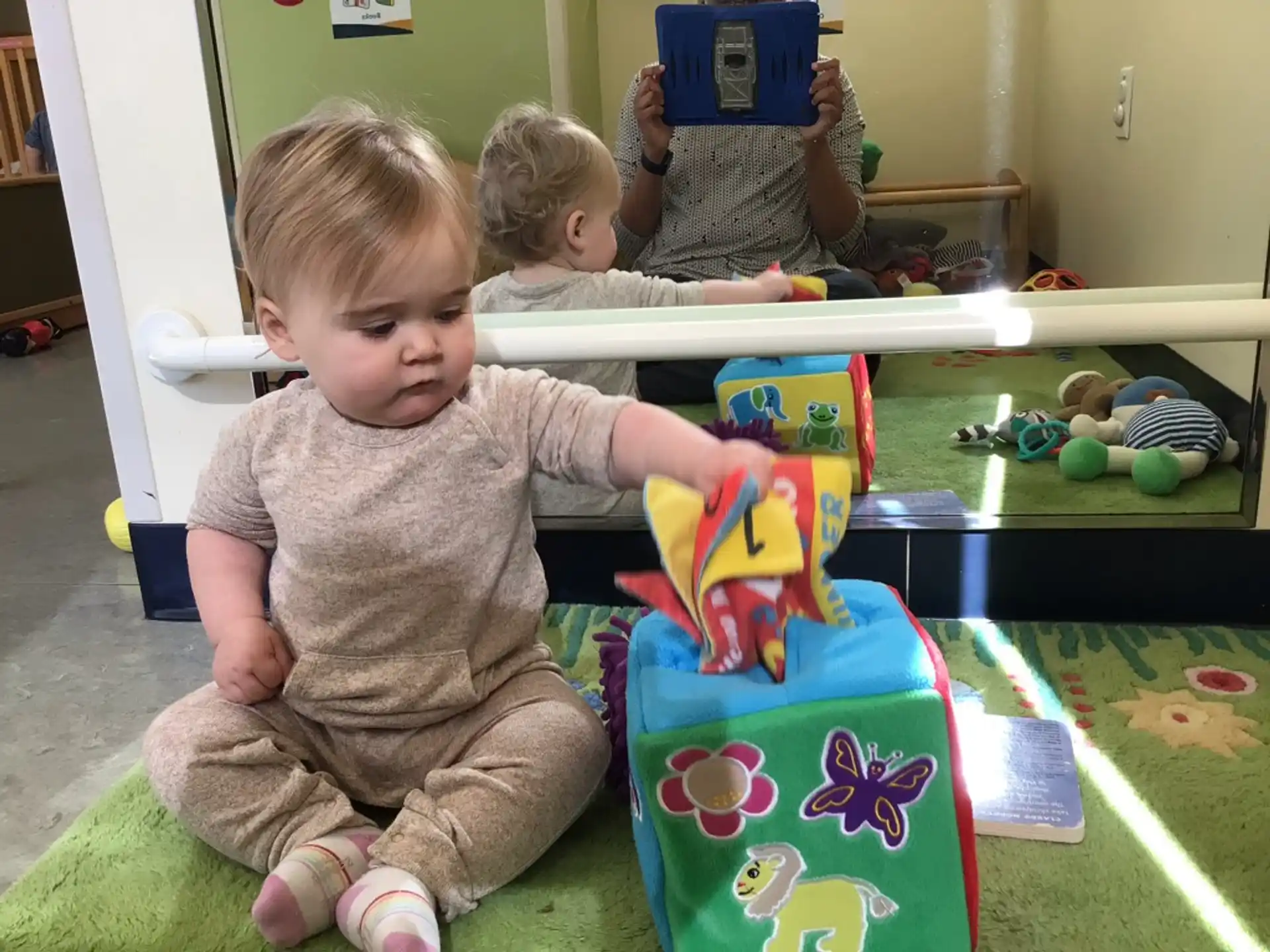 a group of children playing with toys