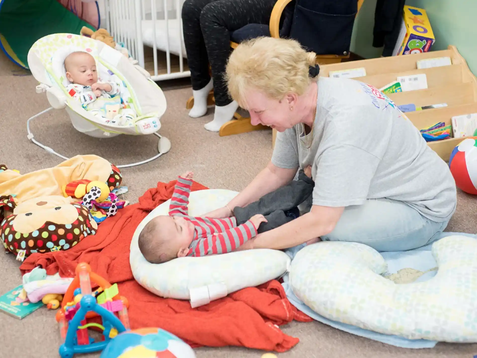 a person holding a baby