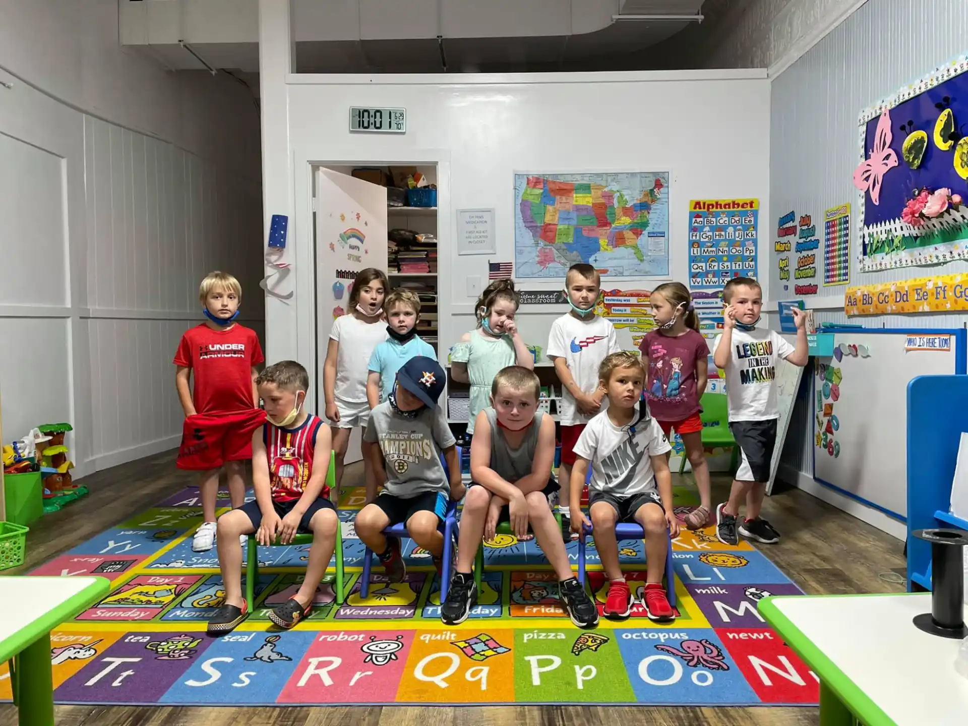a group of kids posing for a photo