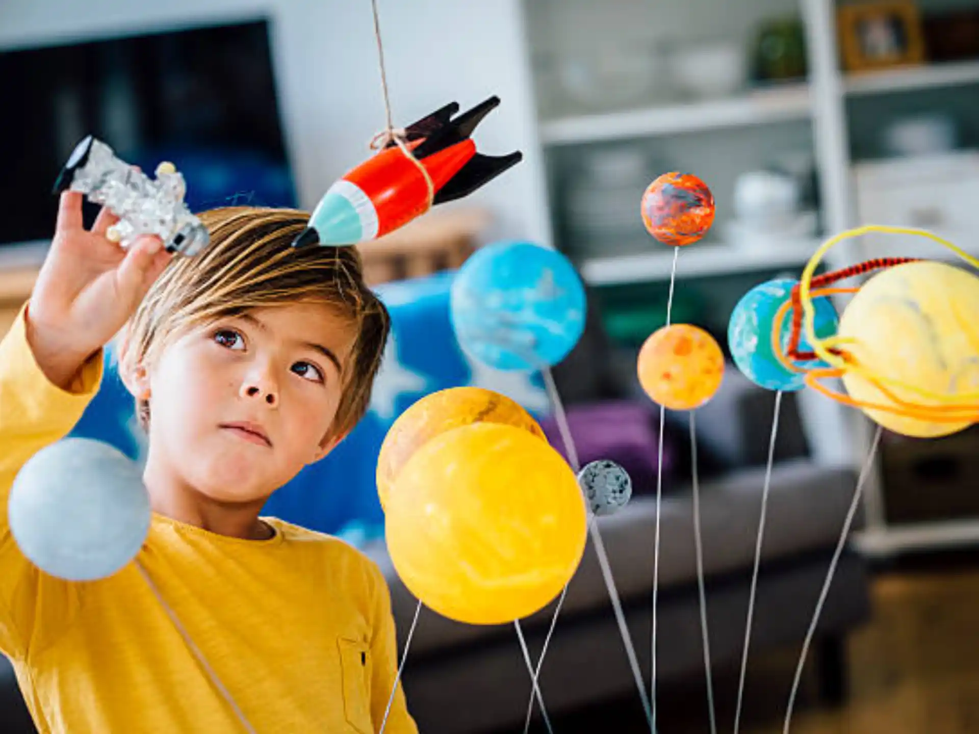 a child holding a balloon