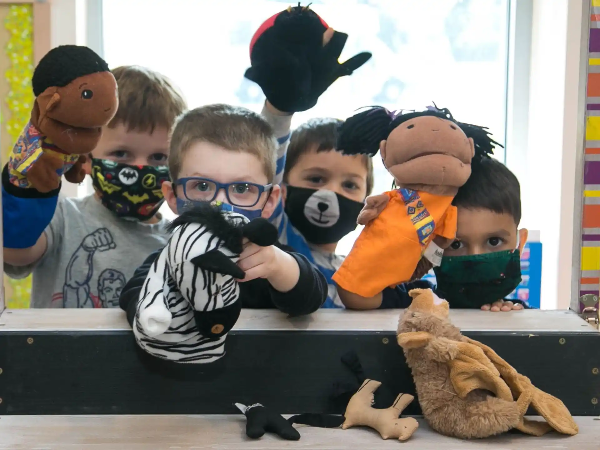 a group of kids wearing clothing