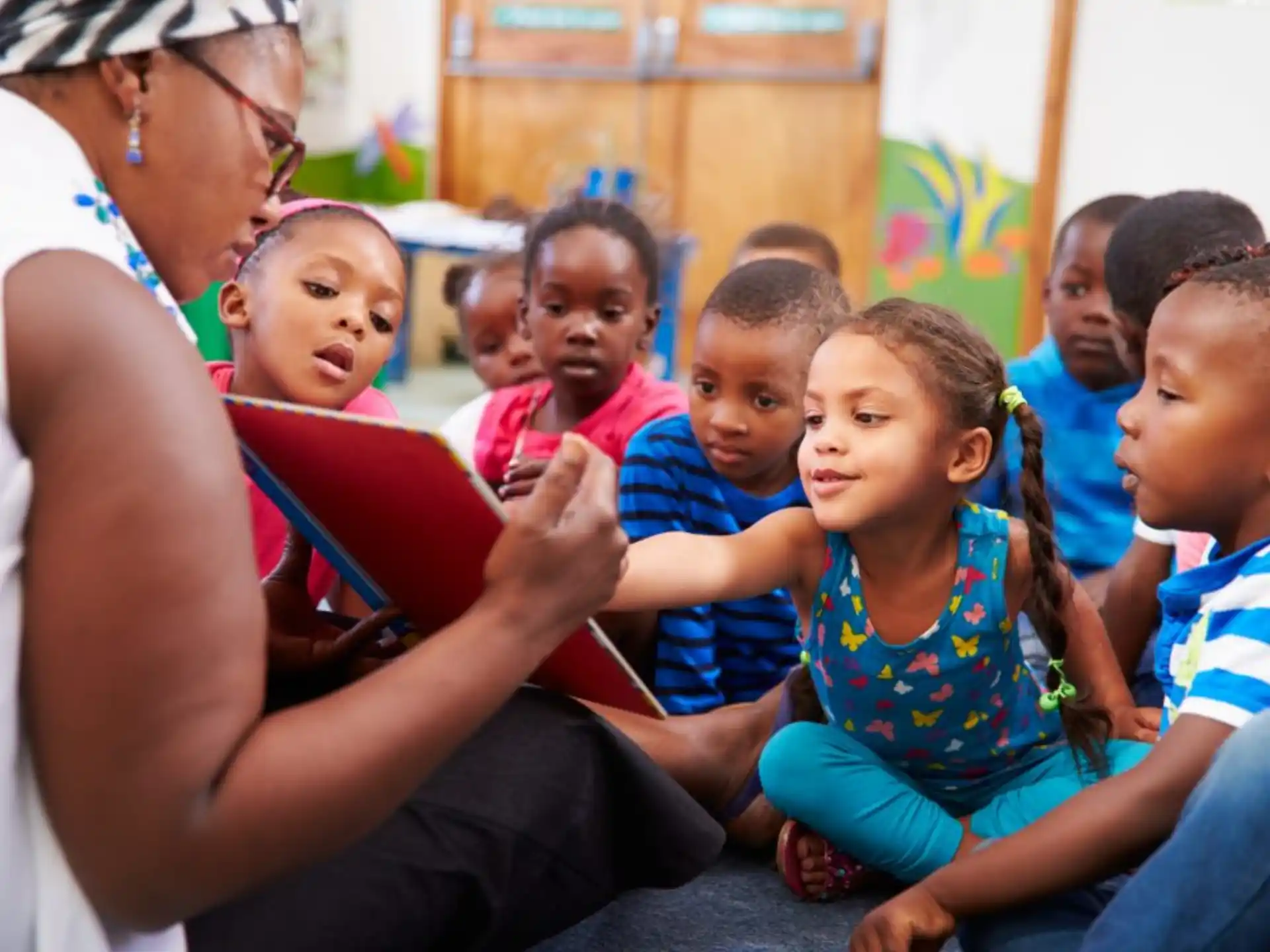 a person and a group of children