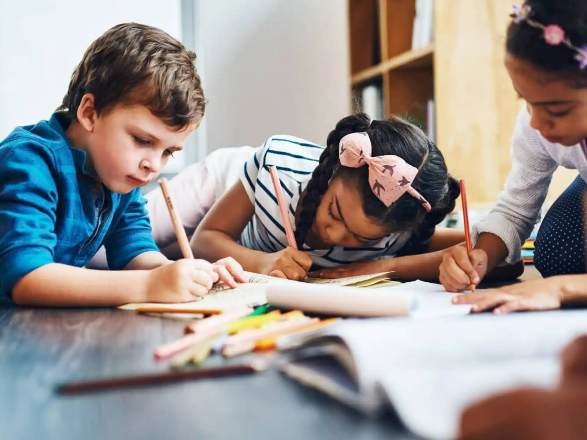 a few children studying together