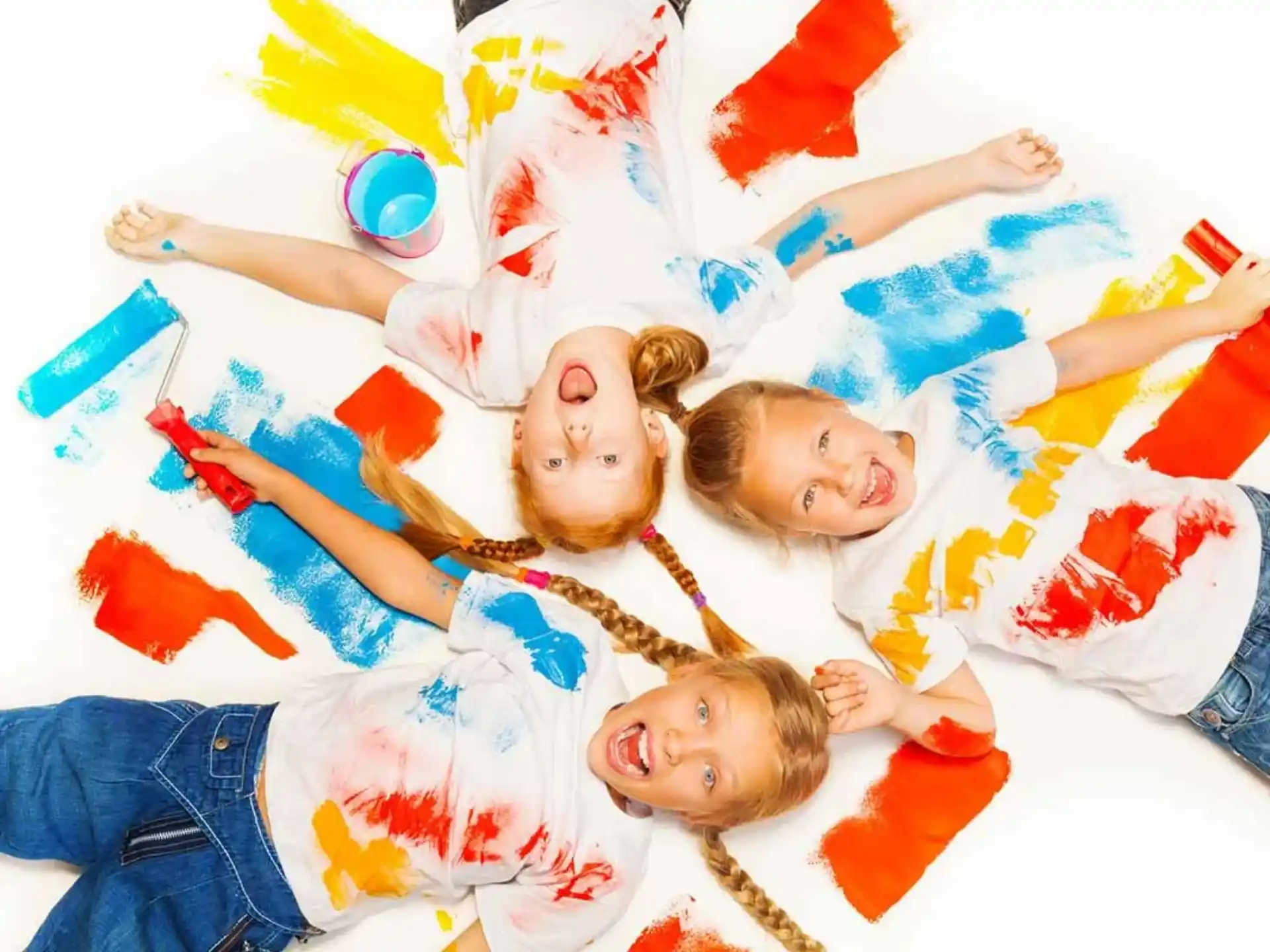 a group of children lying on the ground