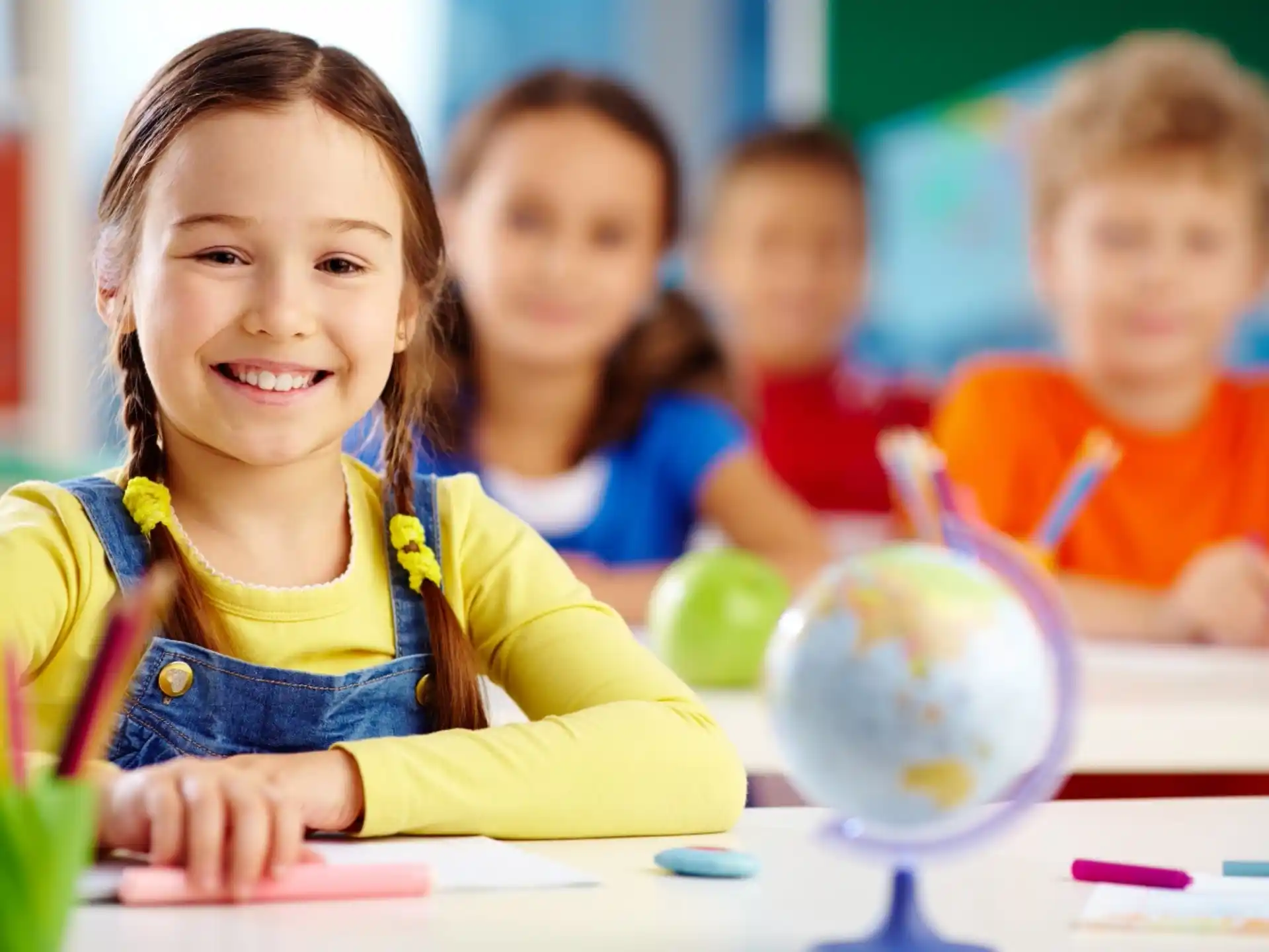 a young girl smiling