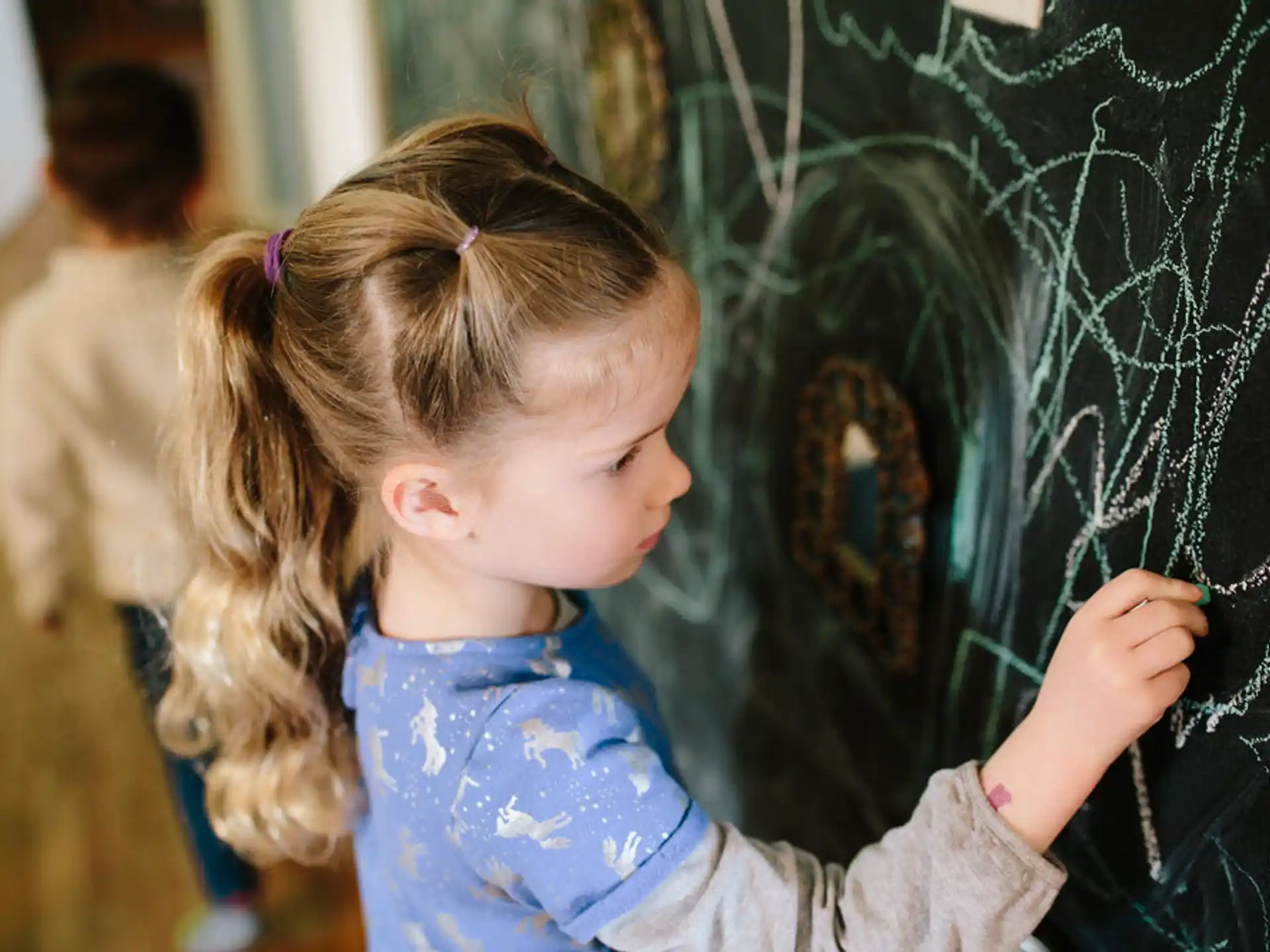 a young girl painting