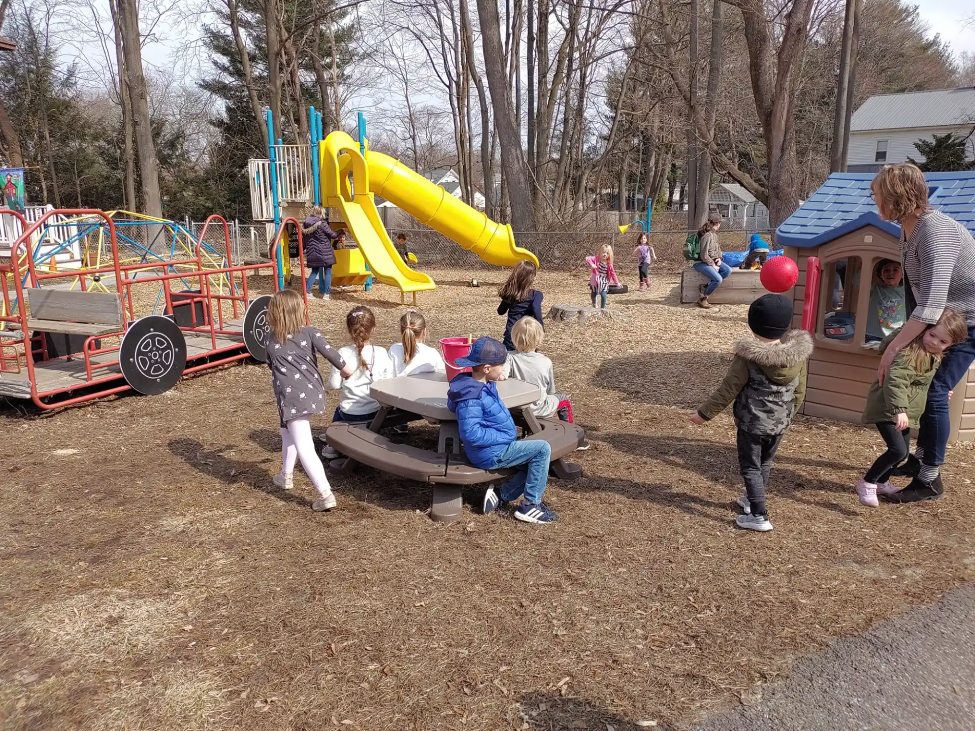 a group of people playing on a playground