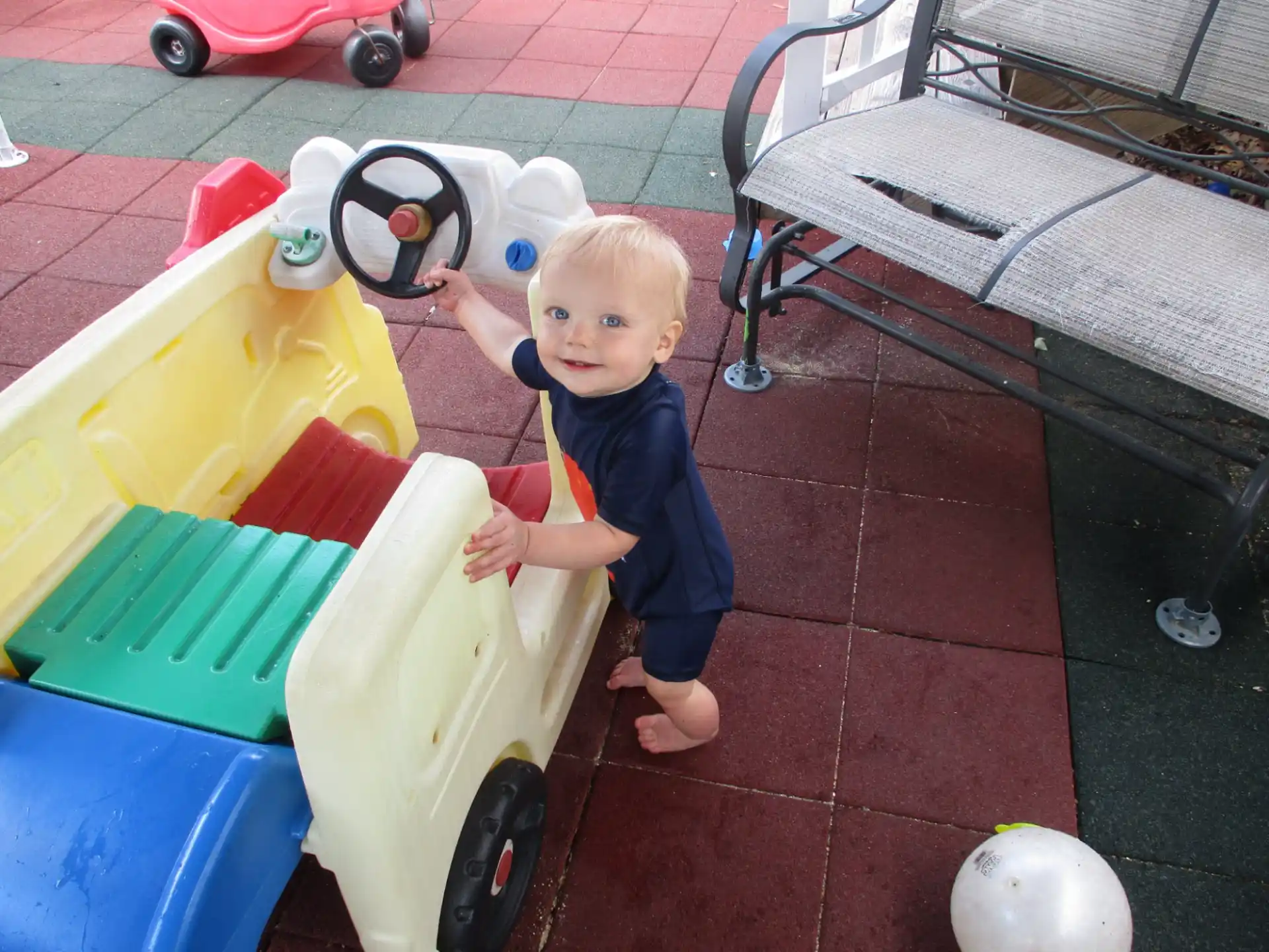 a baby playing with toys