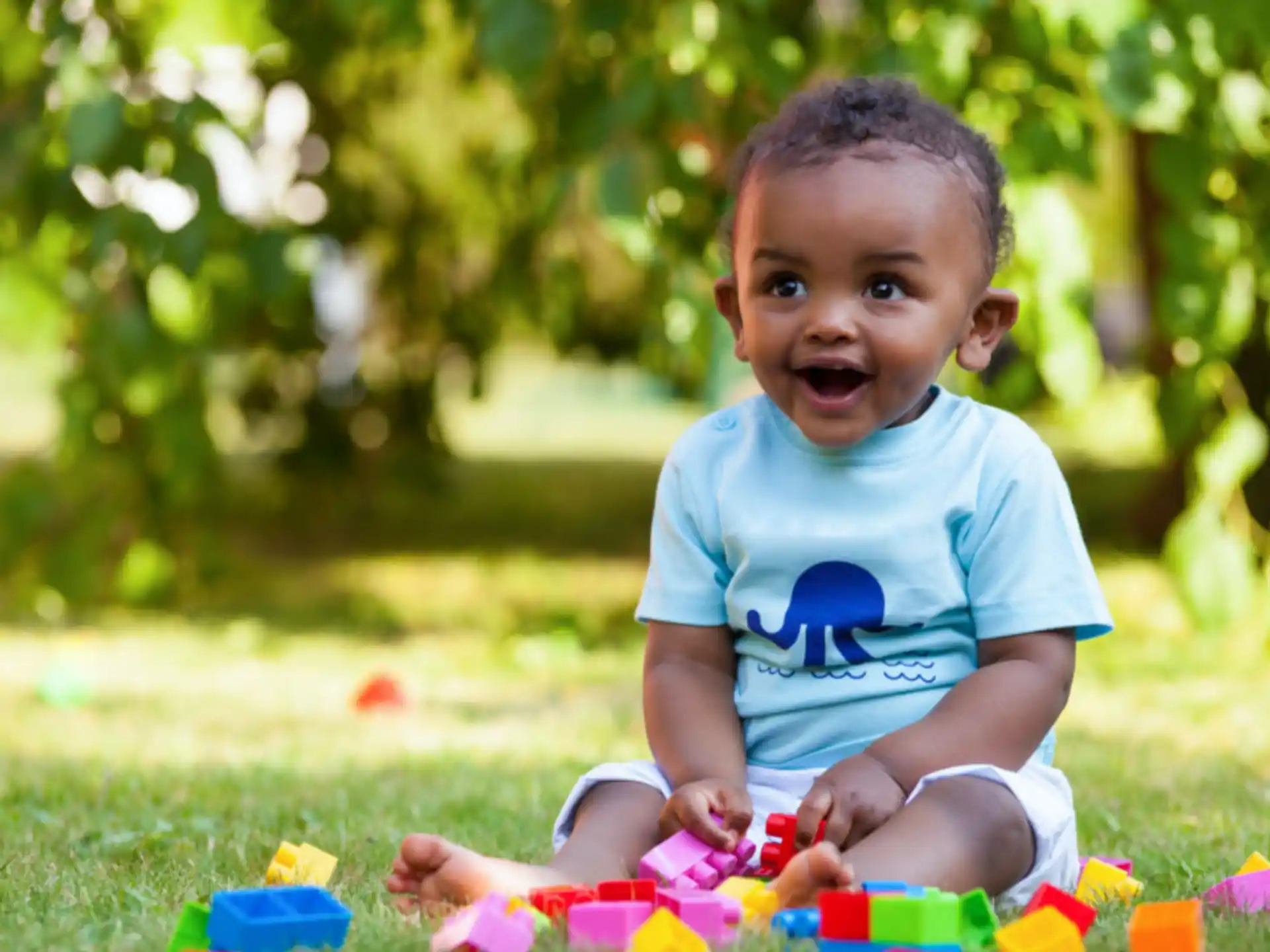 a baby playing with toys