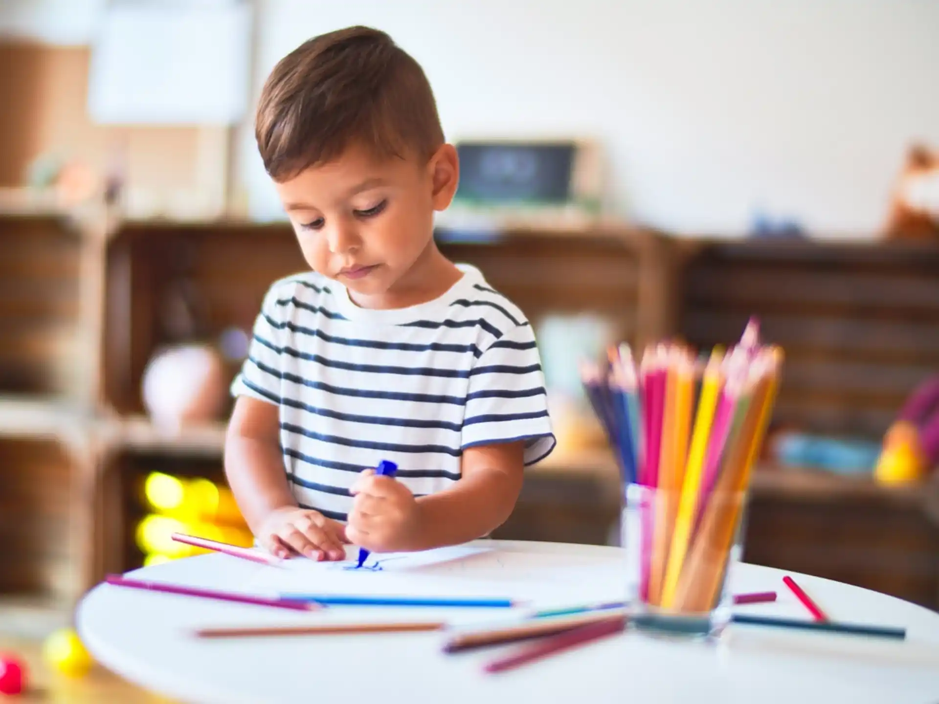 a child sitting at a table