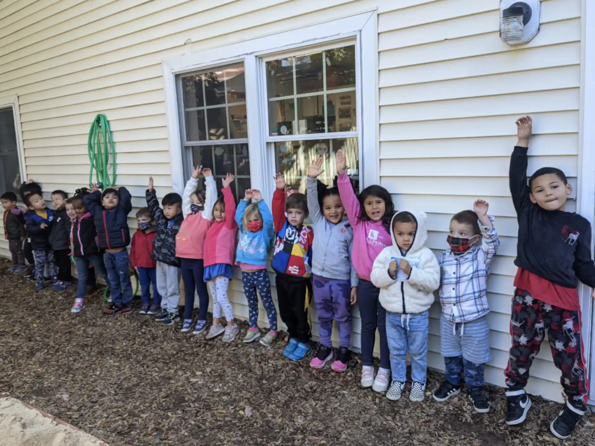 a group of children posing for a photo
