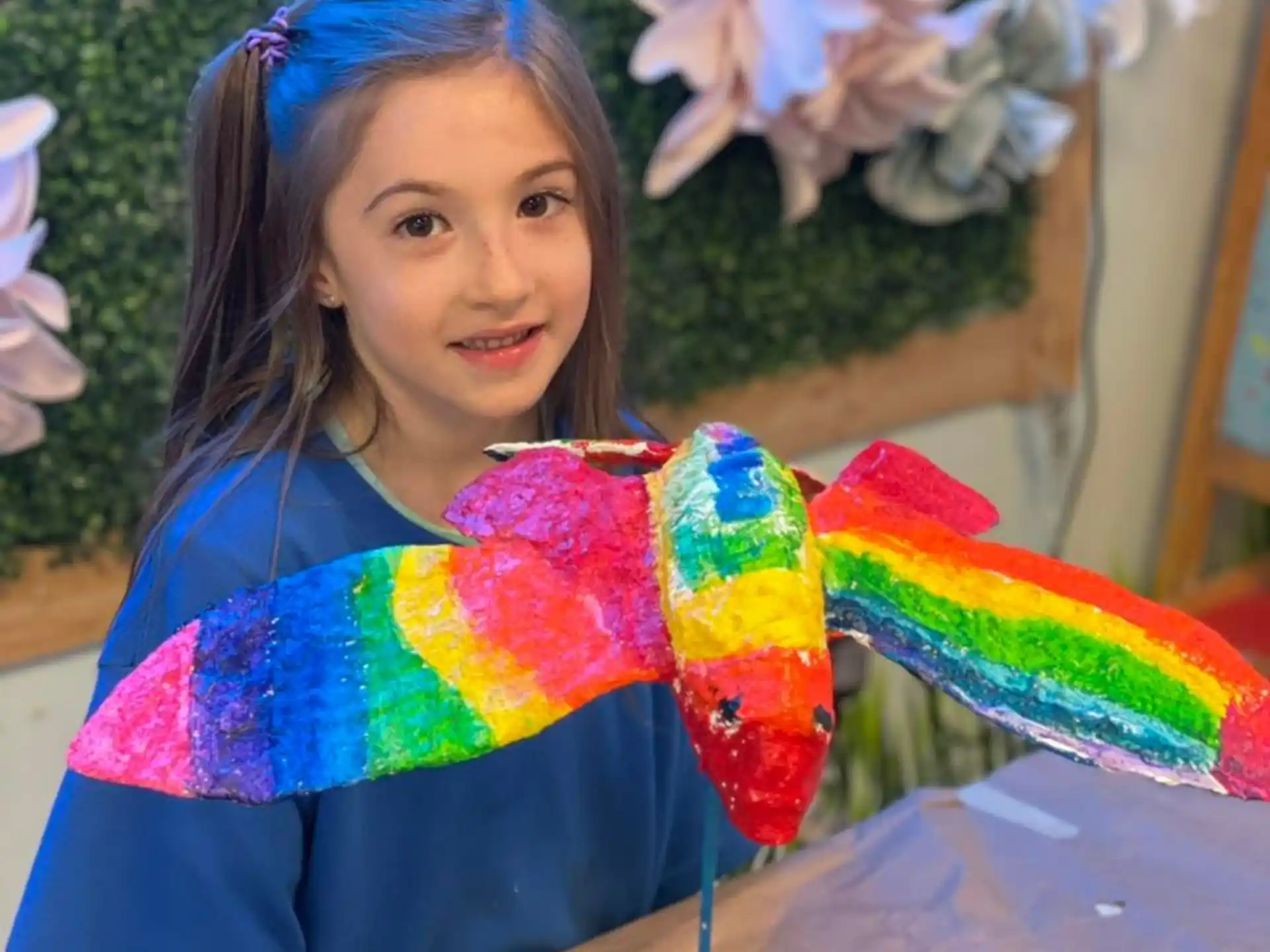 a girl in a colorful garment