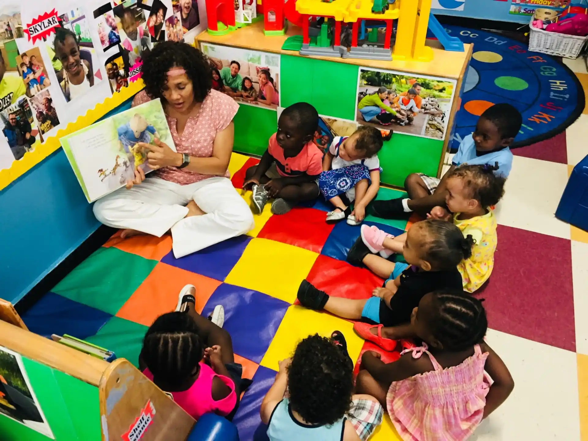 a person teaching a group of children