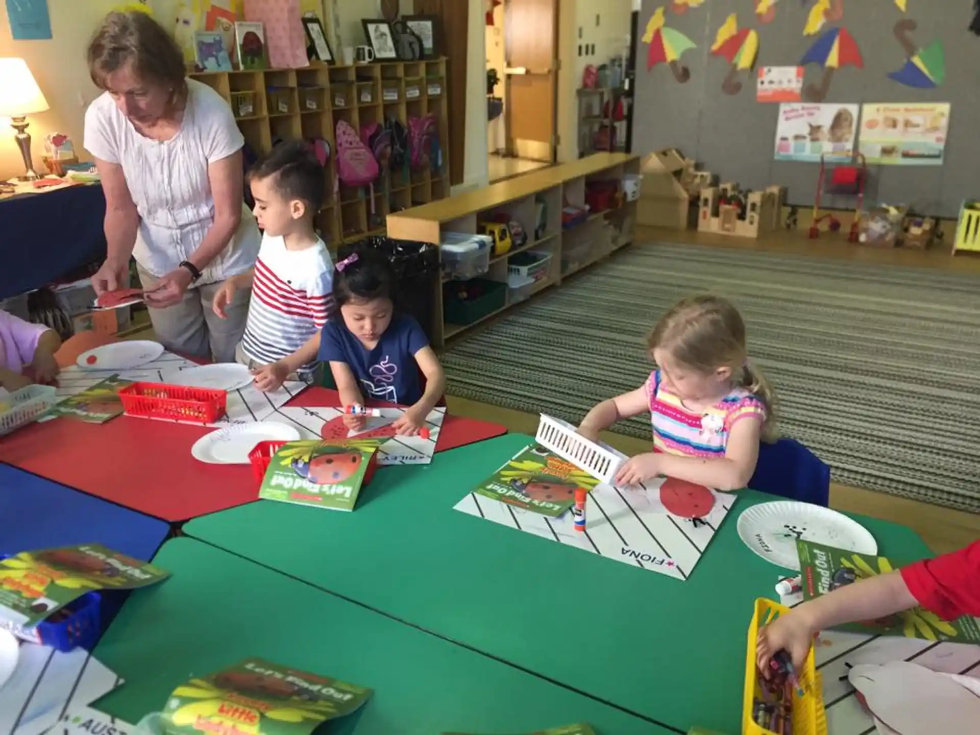 a group of children playing a board game