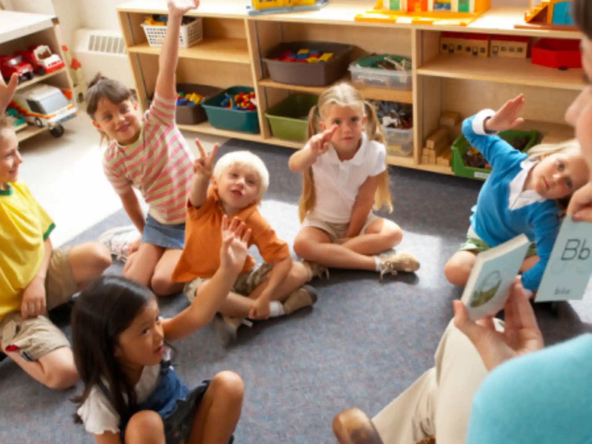a group of children sitting on the floor