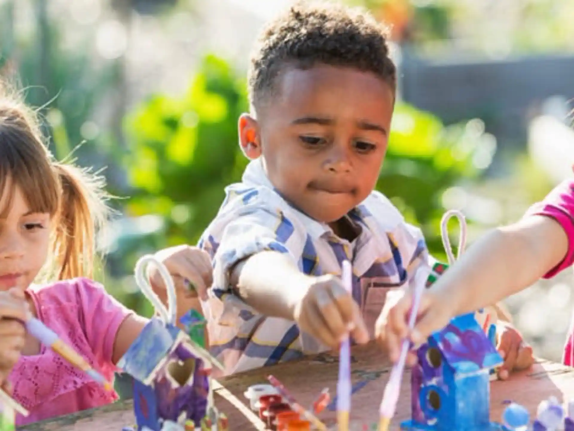 a group of children playing with a toy