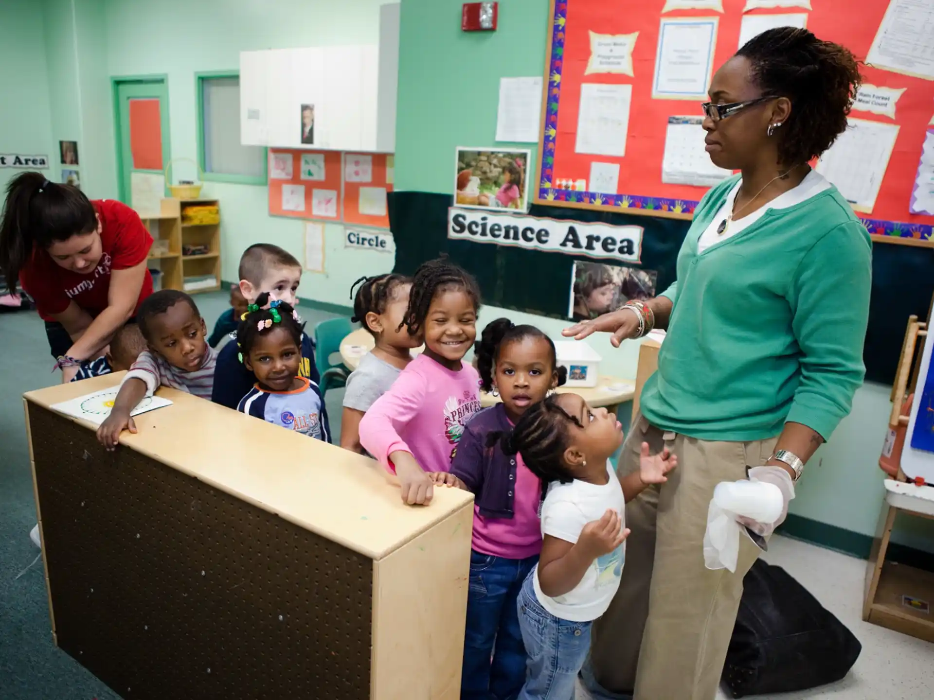 a person and a group of children