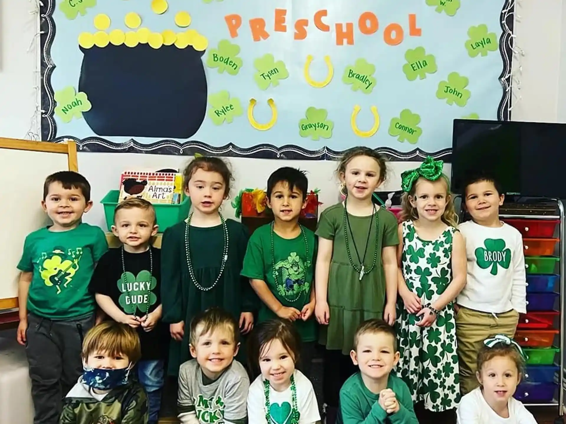 a group of children posing for a photo