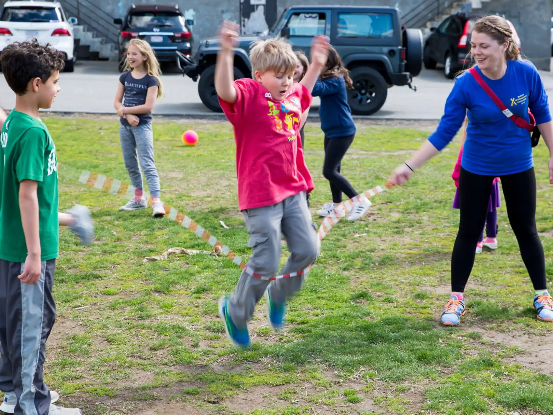 a group of children playing with a ball