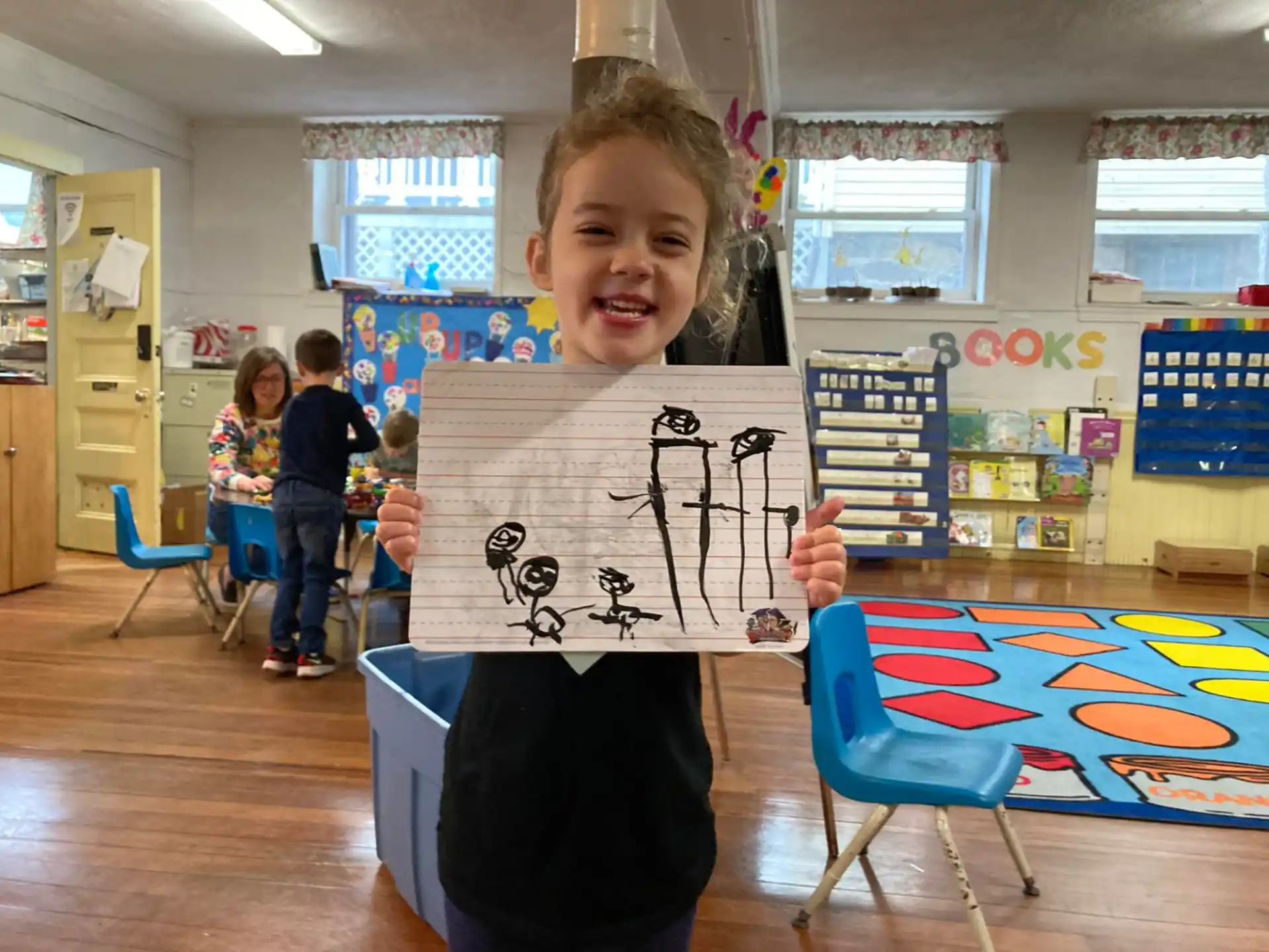a boy holding a sign