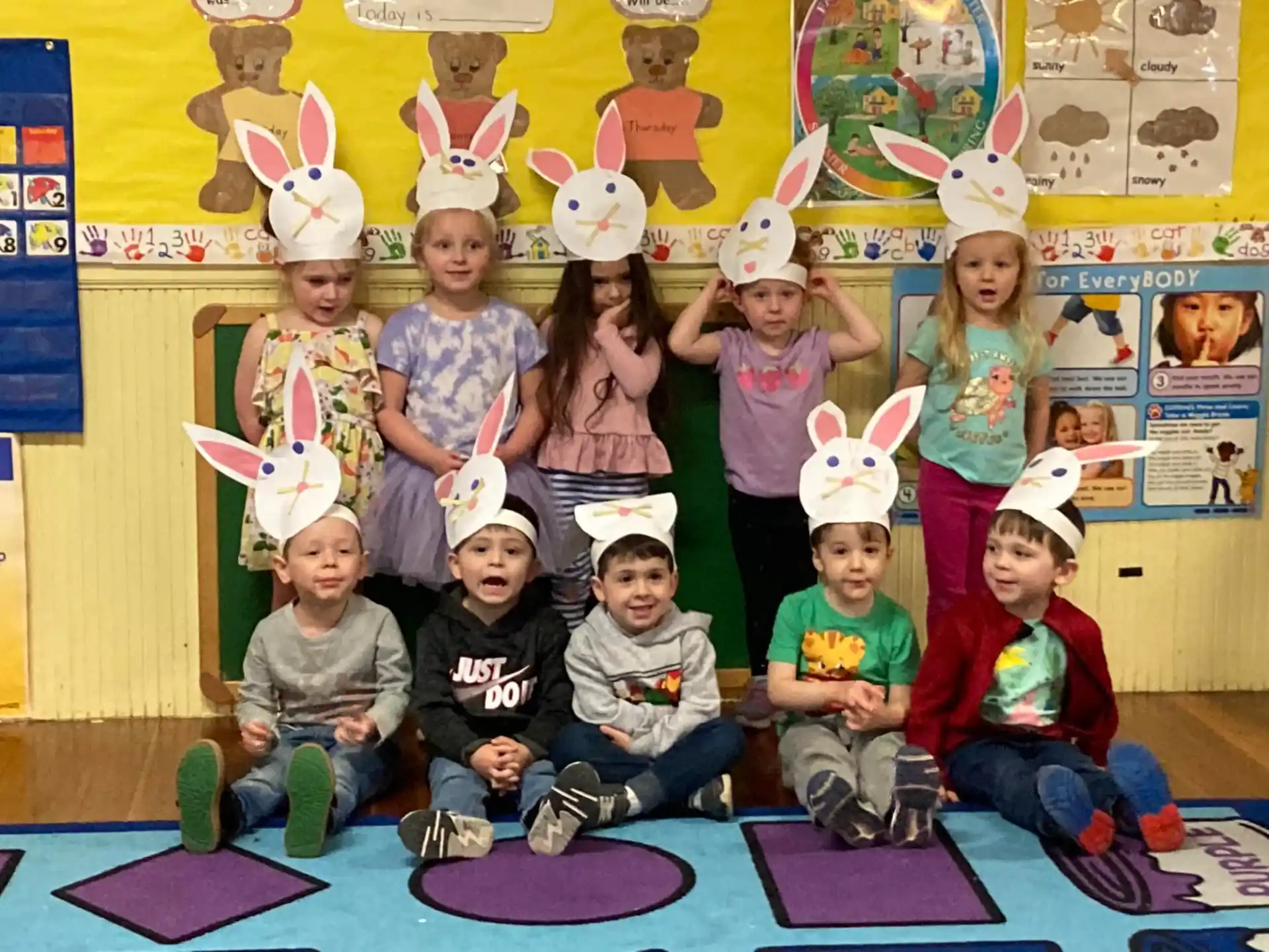 a group of children wearing bunny ears
