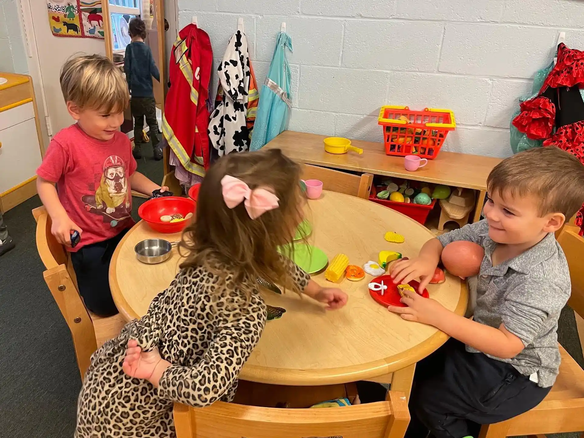 children sitting at a table