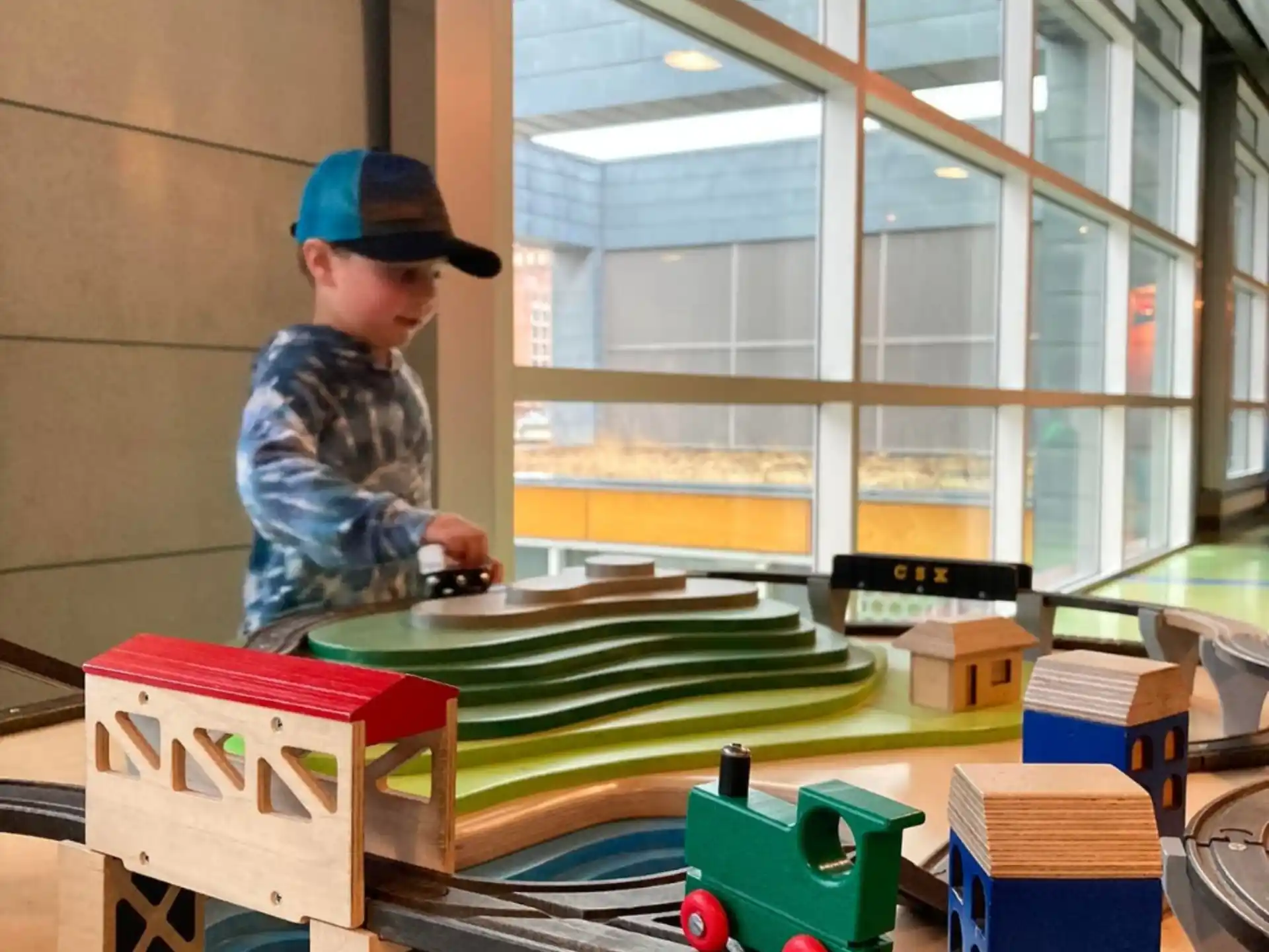 a boy playing with toys