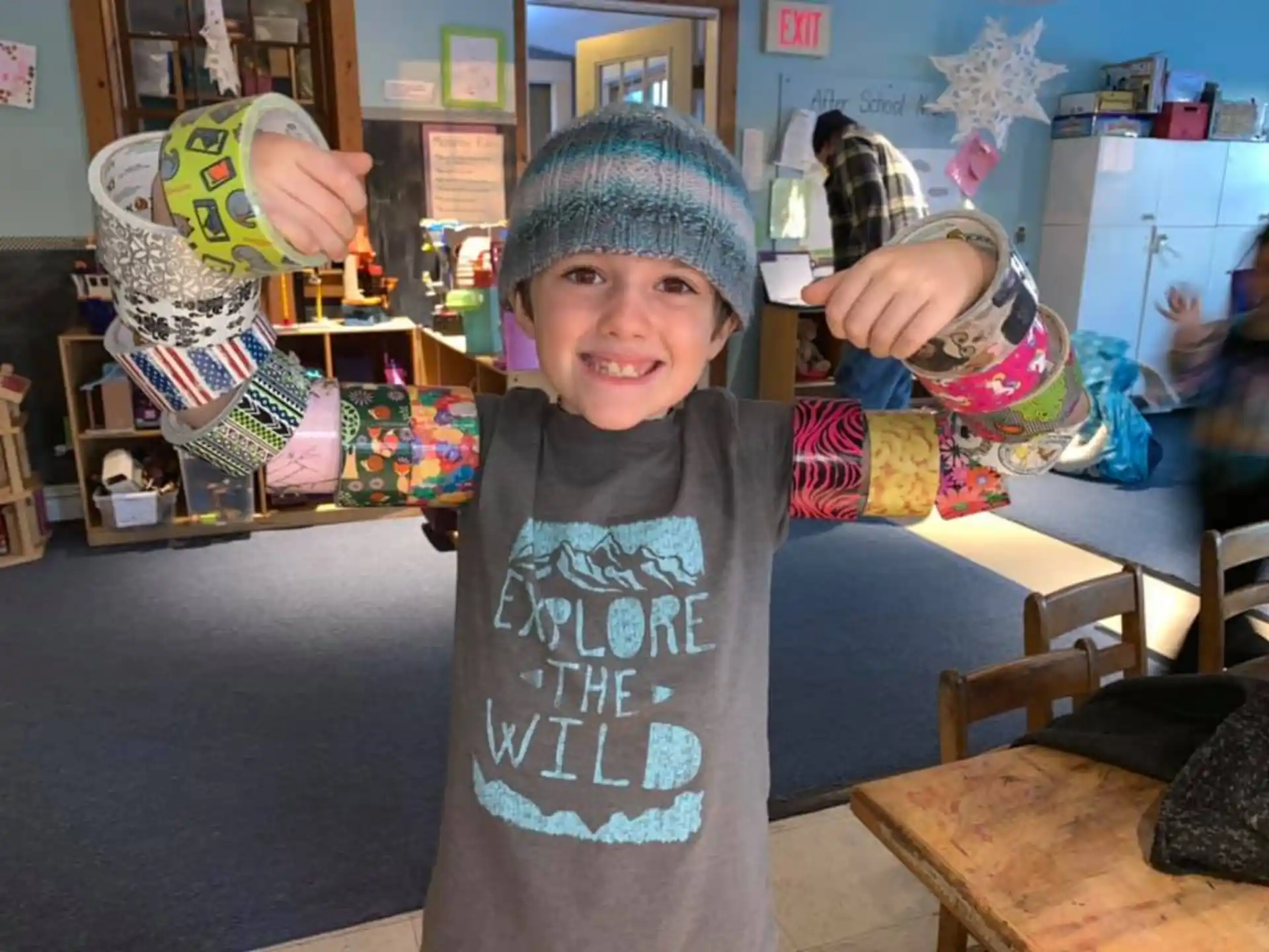 a boy holding a bowling ball
