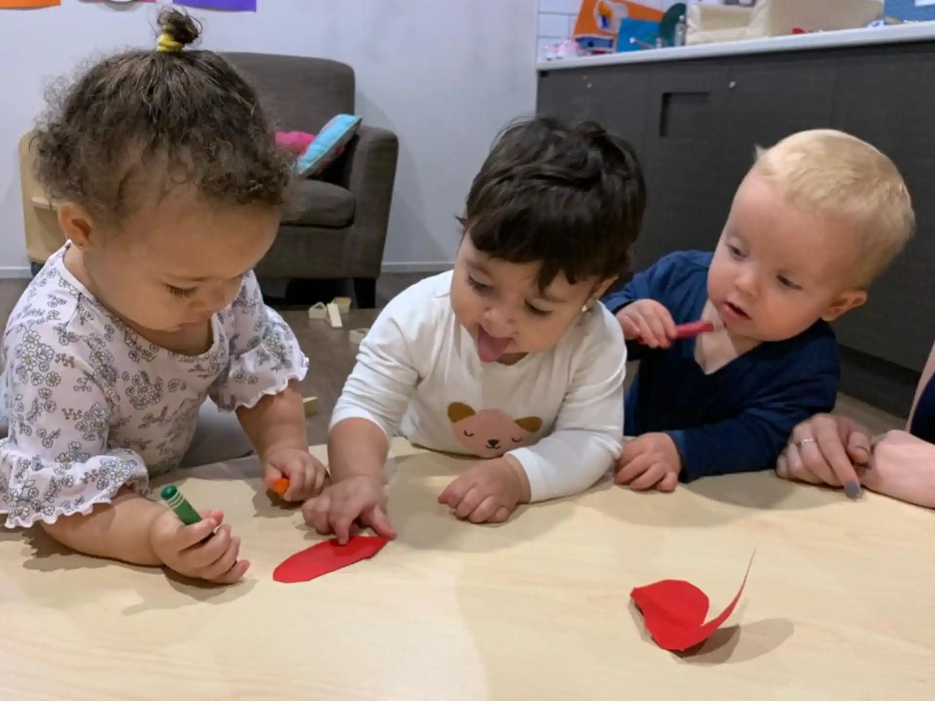 a group of children playing with toys