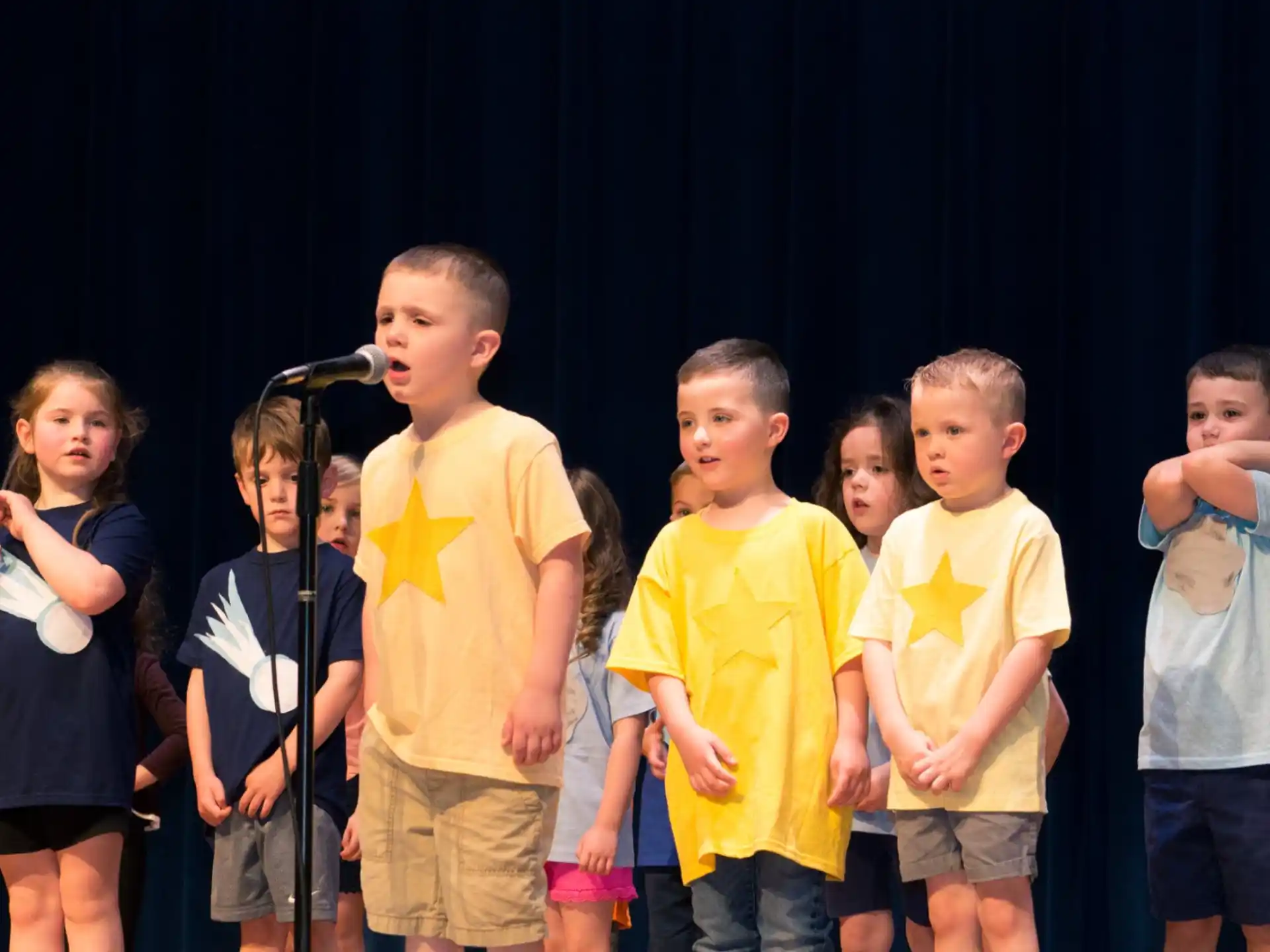 a group of children singing