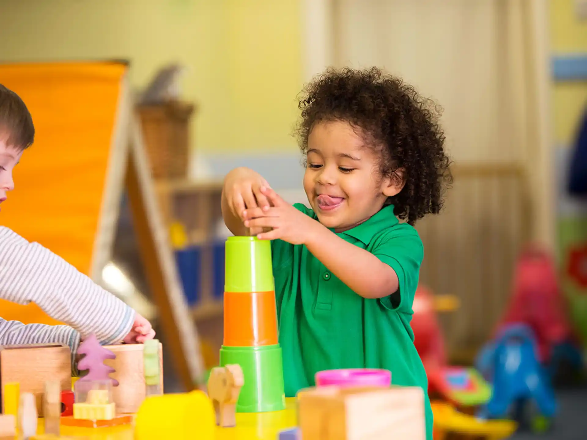 a young girl playing with toys
