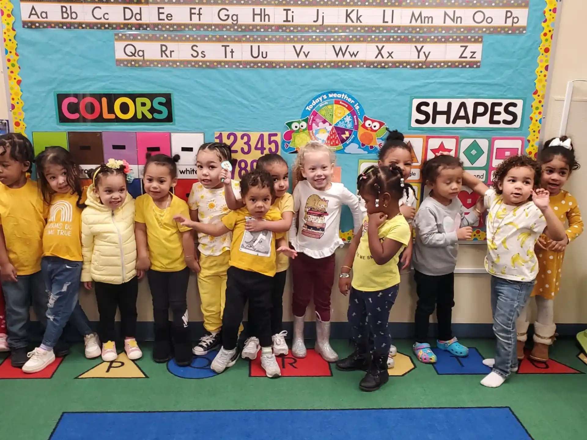 a group of children posing for a photo