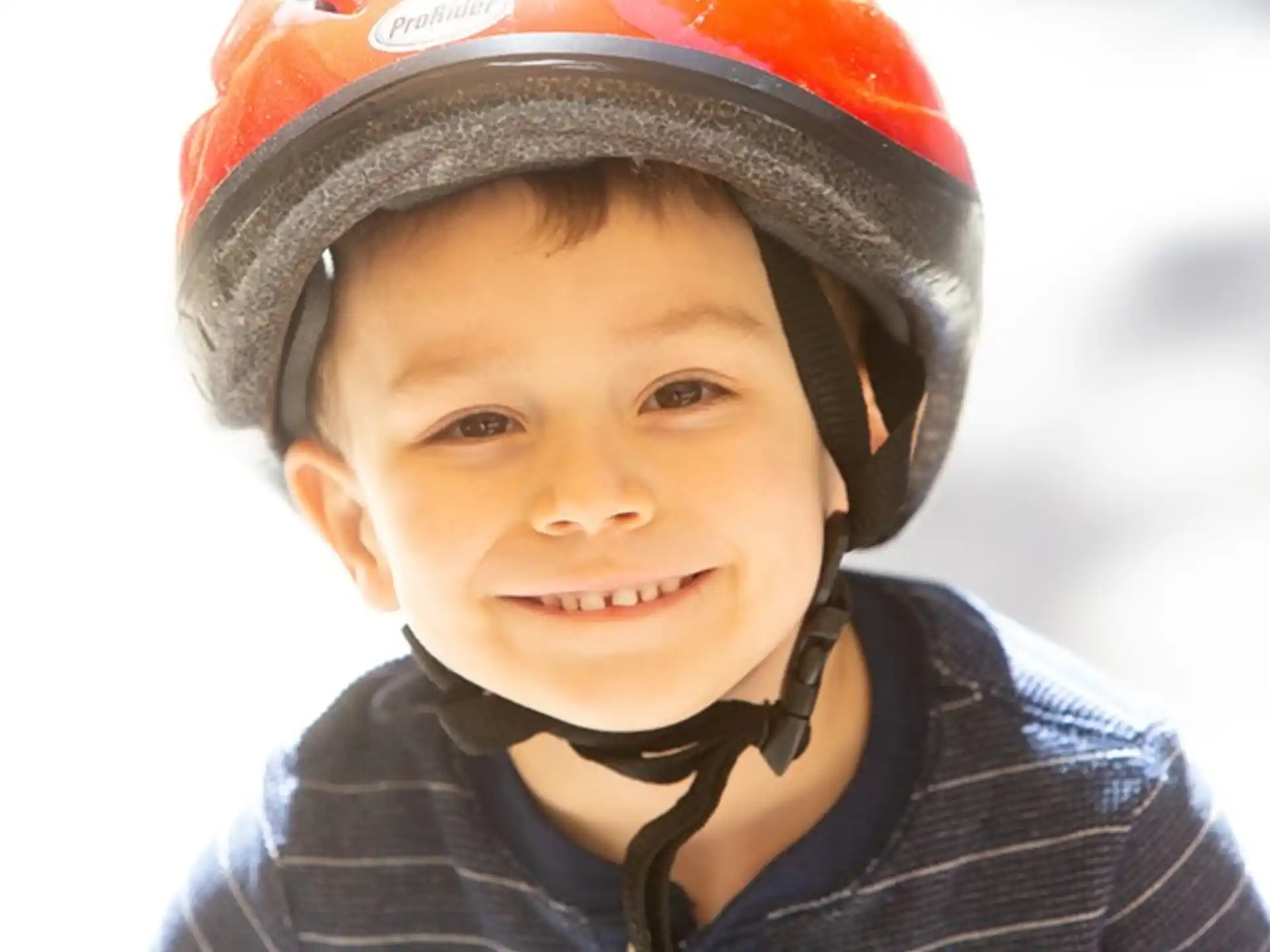 a boy wearing a helmet