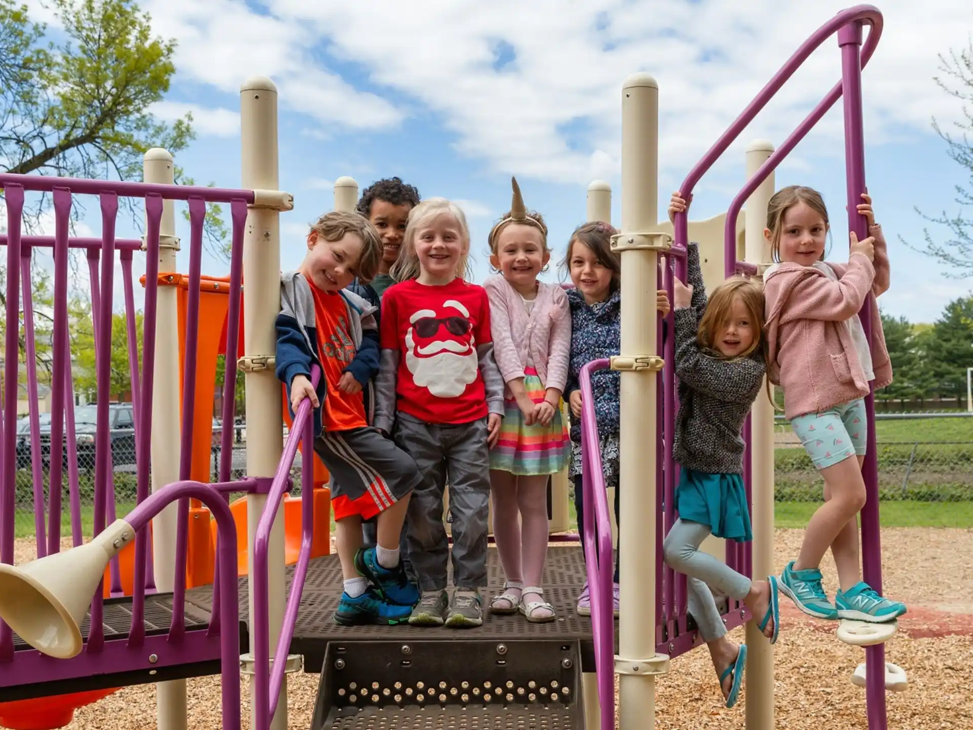 a group of children posing for a photo