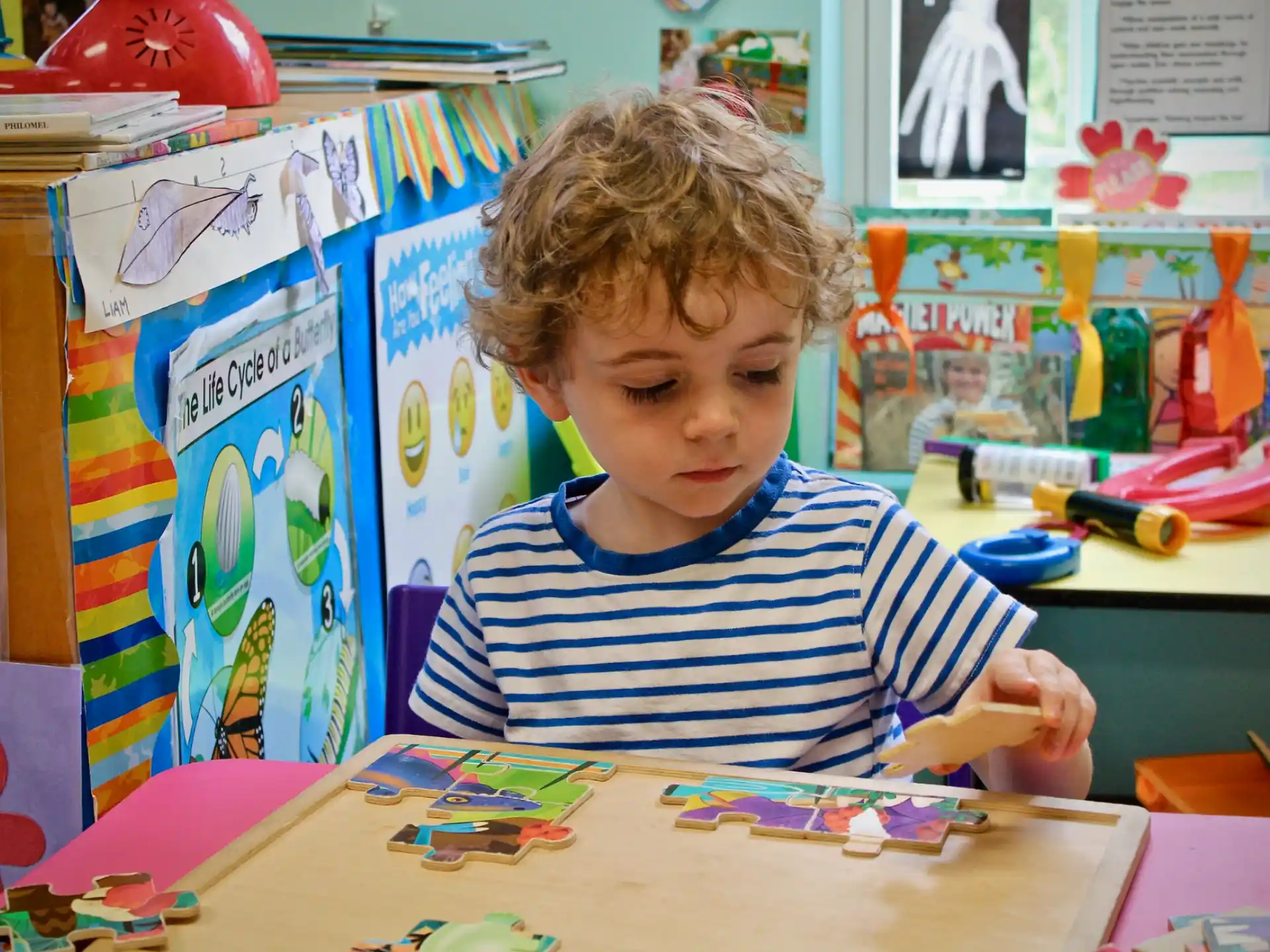 a child sitting at a table
