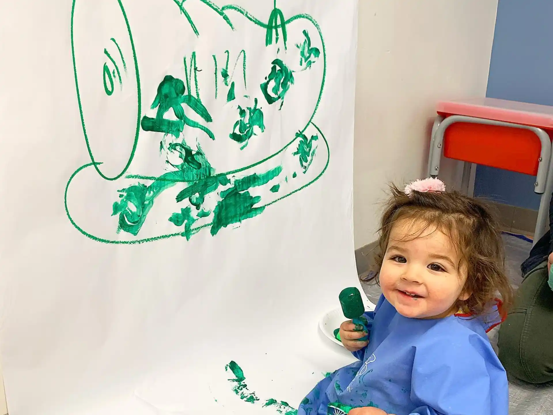 a child sitting on the floor