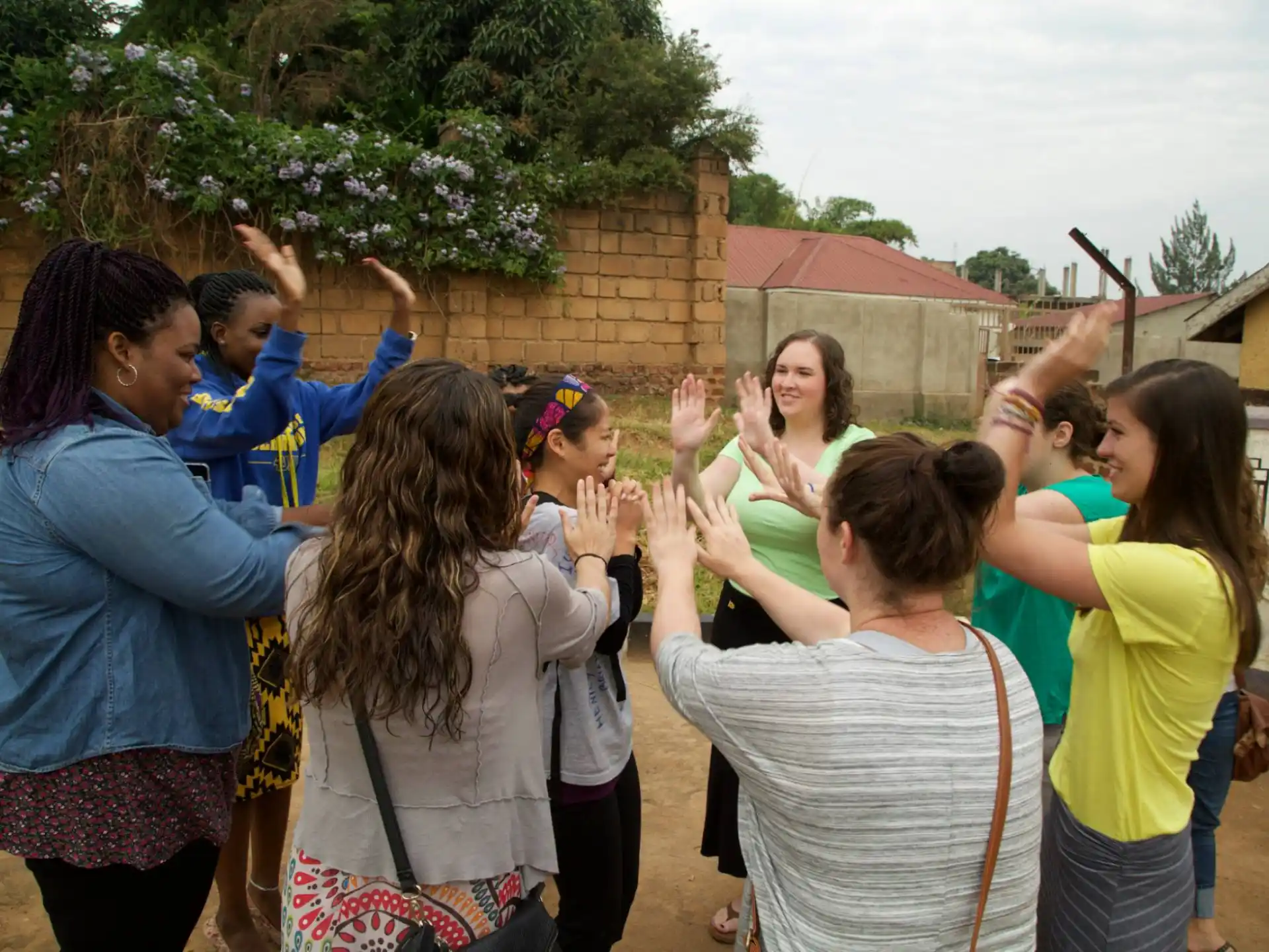 a group of women standing outside