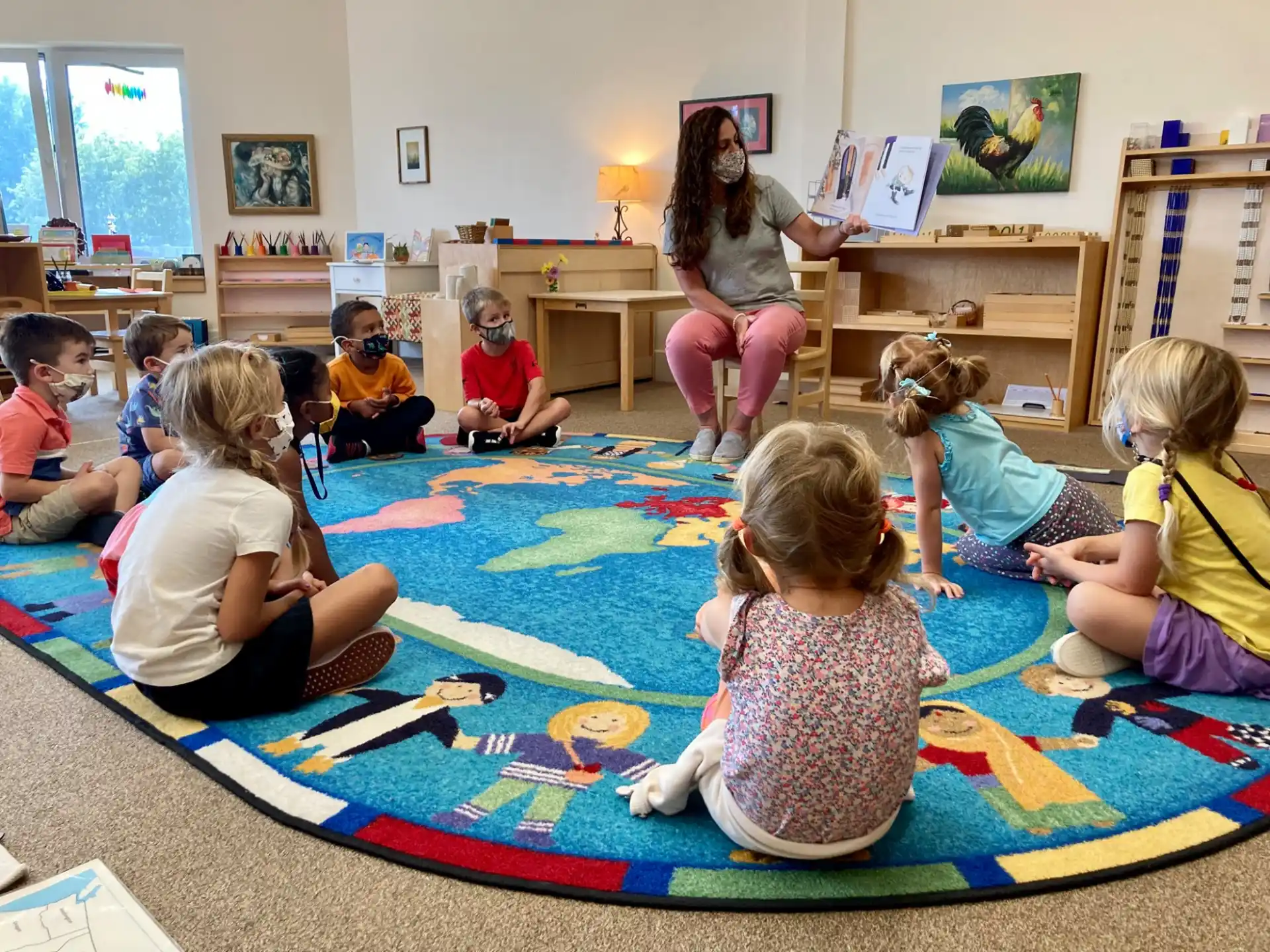 a group of children sitting on the floor