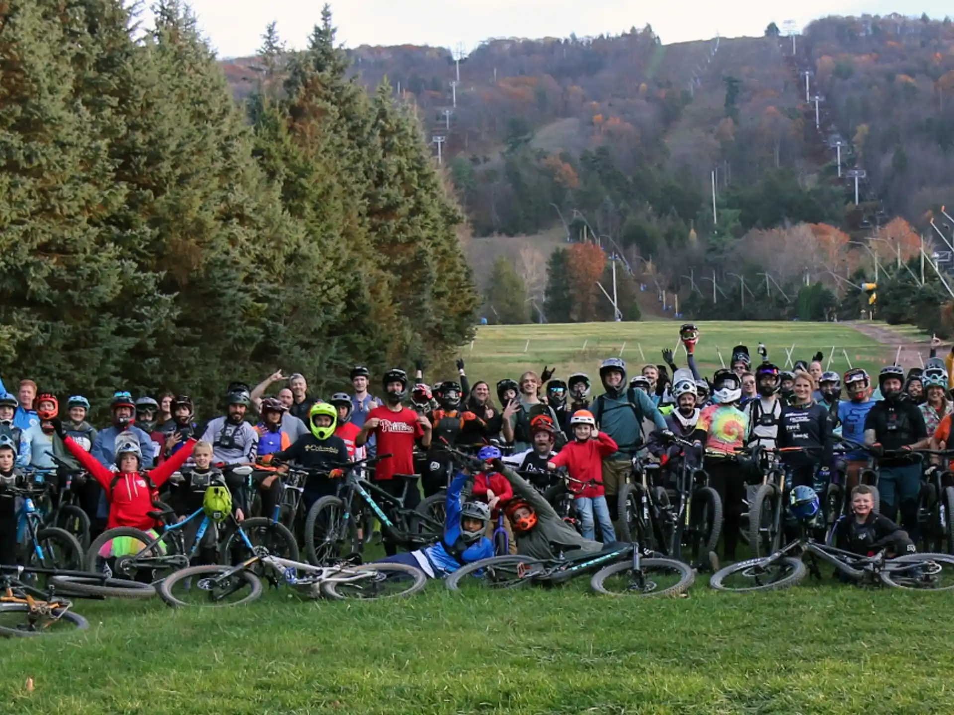 a group of people with bicycles
