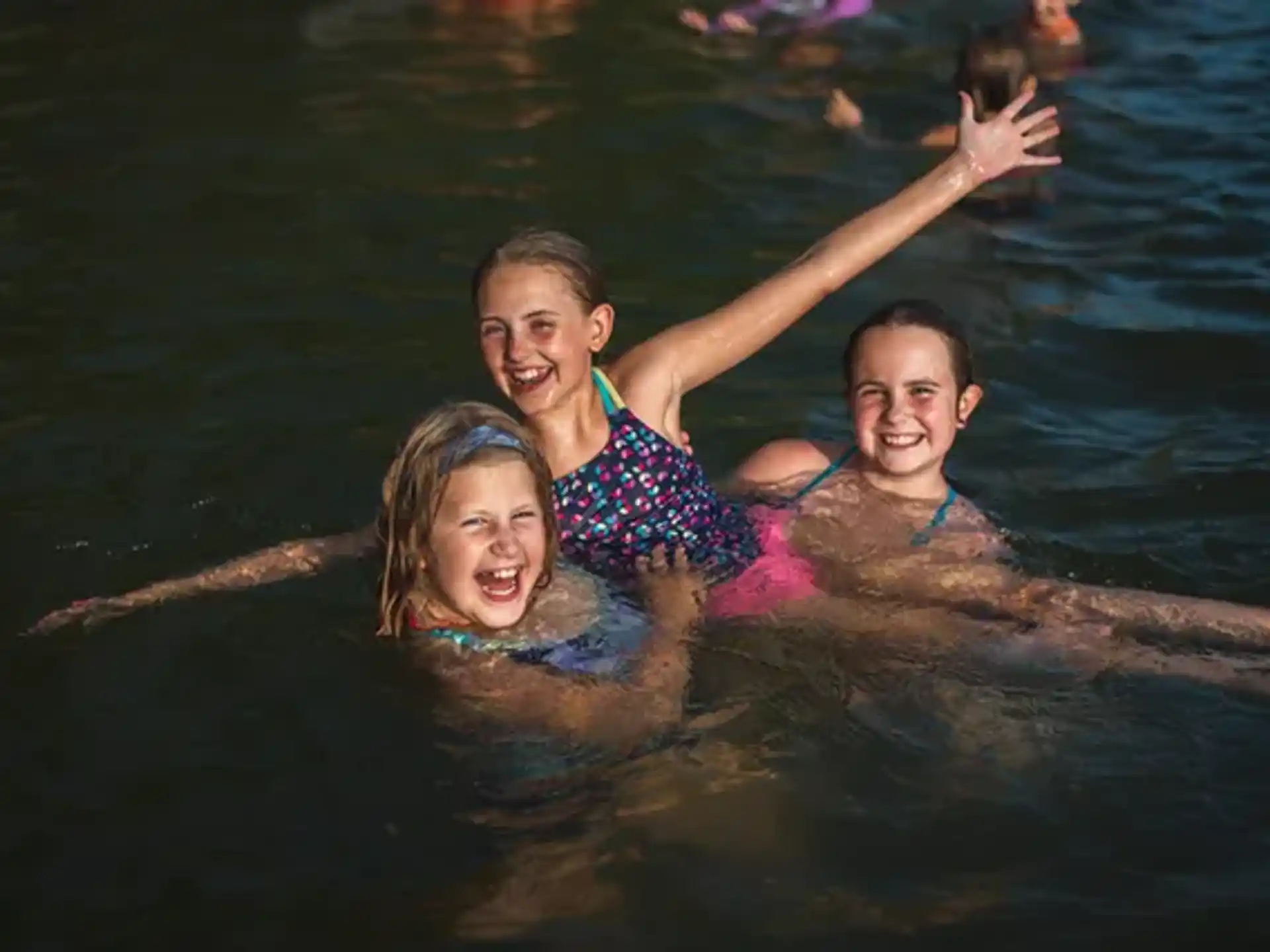 a group of people in the water