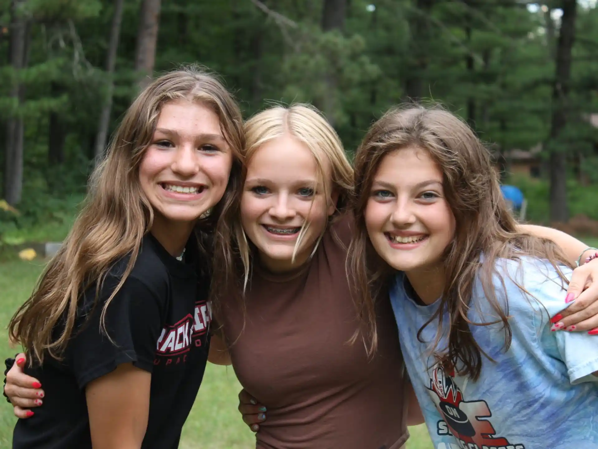 a group of women smiling